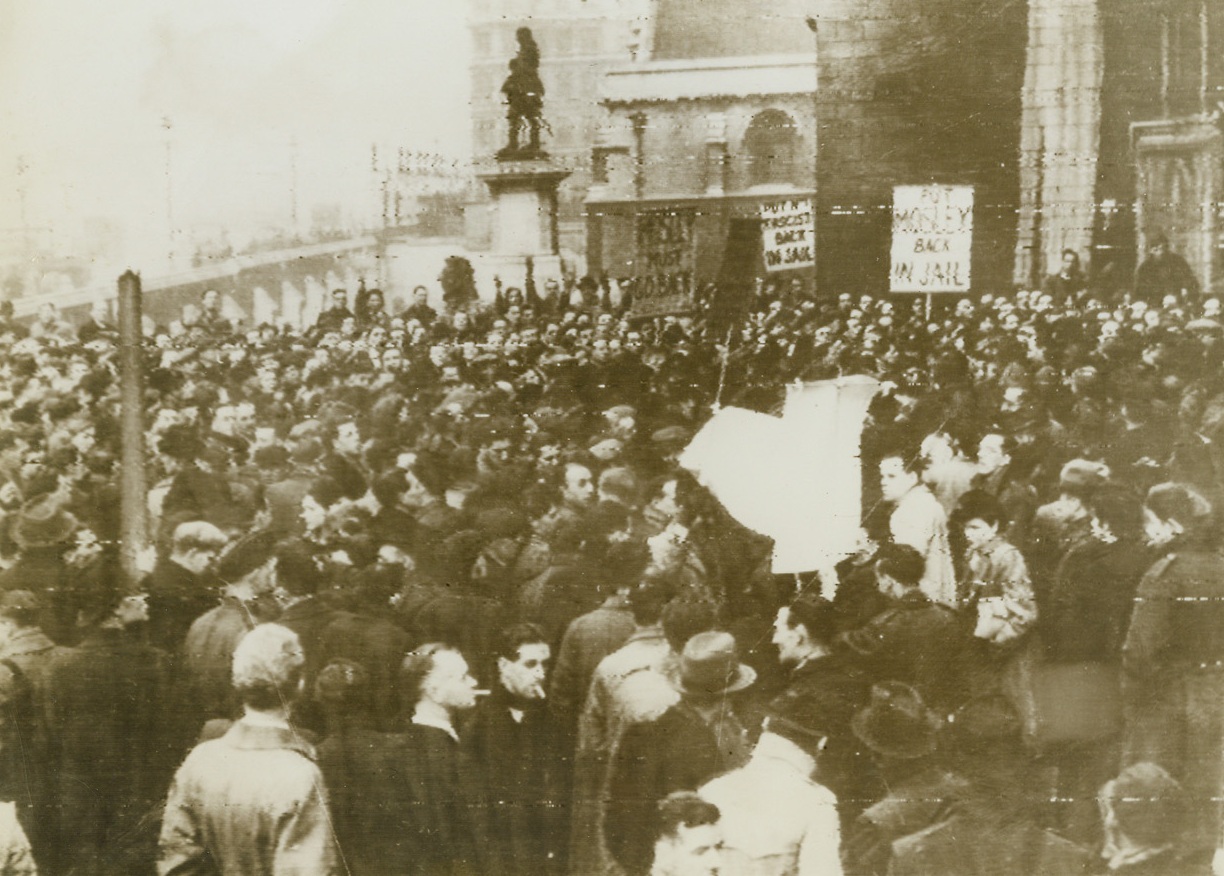 LONDONERS DEMAND MOSLEY BE JAILED AGAIN, 11/24/1943. LONDON – Carrying anti-Mosley banners, a crowd of workers demonstrate outside the parliament building in London, Nov. 23rd, in protest against the liberation from prison of Sir Oswald Mosley, British pre-war fascist leader.  It is said that Mosley was released because of ill health.Credit: Acme;