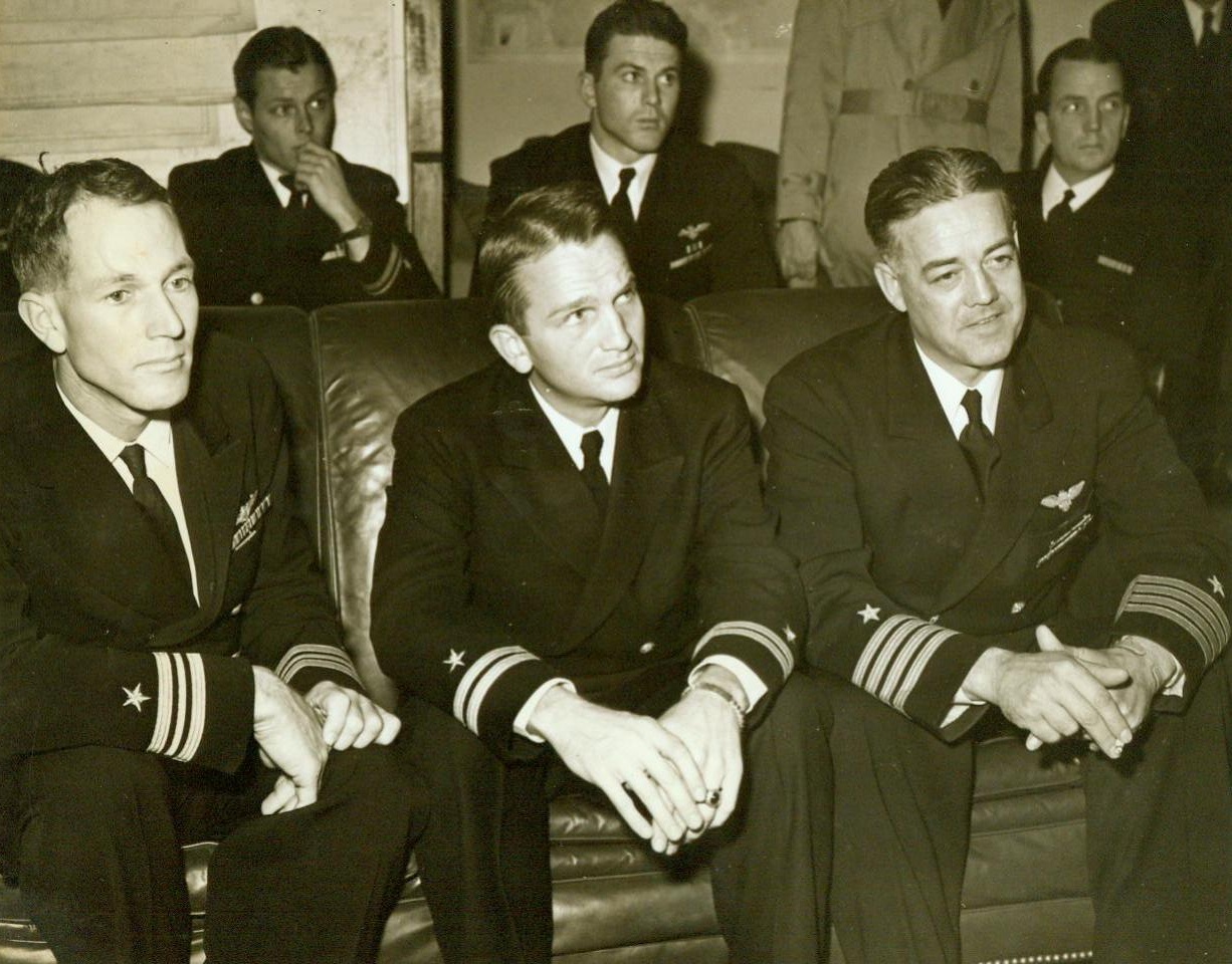 Tell Of Anti-Submarine Warfare, 11/10/1943. Washington, D.C. -- Lt. Comdr. Howard M. Avery (L) commander of a squadron based on the aircraft carrier Card: Lt. Charles H. Hutchins (C), of Terre Haute, IND., commander of the Destroyer Borie, which was sunk; and Captain Arnold L. Isbell of Chicago, ILL., commander of the Baby Flat-Top Card; Tell of their experiences in battling the submarine menace. For their work their units received a Presidential Citation. The anti-submarine group set a record in sinkings. 11/10/43 (ACME); Tell of their experiences in battling the submarine menace. For their work their units received a Presidential Citation. The anti-submarine group set a record in sinkings. 11/10/43 (ACME);