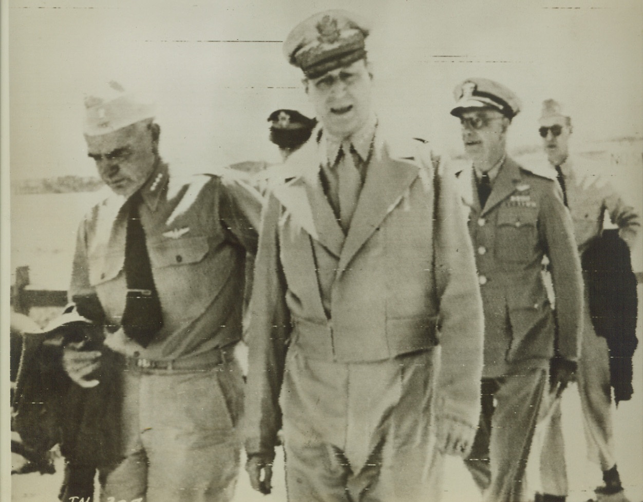 Plan More Jap Headaches, 11/3/1943. In this photo, flashed to the U.S. by radiotelephoto, Admiral William F. Halsey, Jr. (left), Commander of South Pacific Naval Forces, Gen. Douglas Macarthur, Allied Commander-in-Chief in the Southwest Pacific, and Vice Admiral A.S. Carpender, (right, behind Macarthur), Commander of Allied Naval Forces in the Southwest Pacific, are shown “somewhere in Australia,” just after Admiral Halsey’s arrival to confer on plans for the American offensive against the Japs at Bouganville. Credit: U.S. Navy photo via Army radio.;