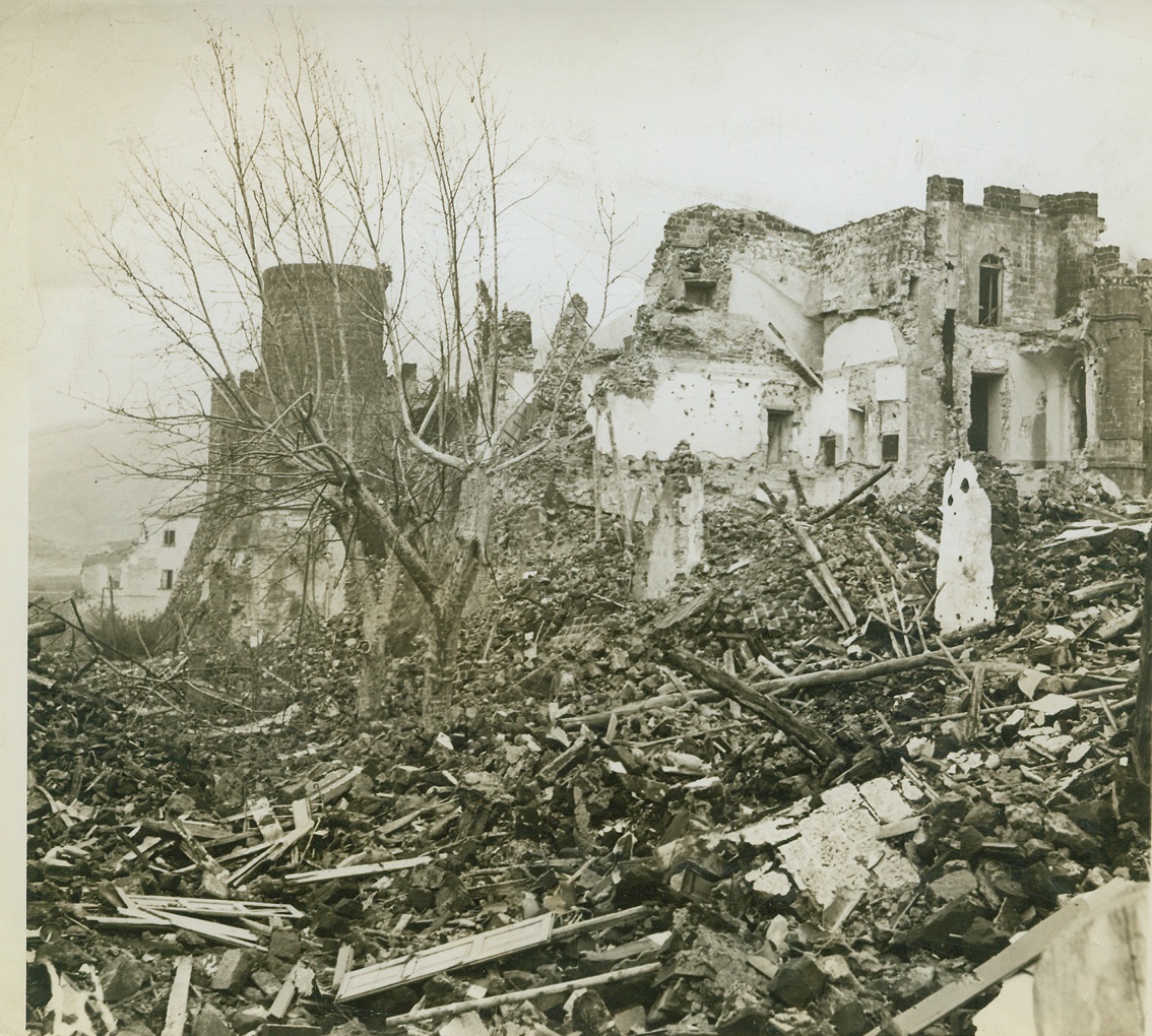 War’s Devastation, 12/221943. Italy – Here’s what was left of the town of Mignano when American troops marched in after pounding out the Germans. Debris clogs every open area and in many cases it is impossible to tell from the ruins what a house looked like before it was smashed. Credit (ACME Photo by Sherman Montrose, War Pool Correspondent);
