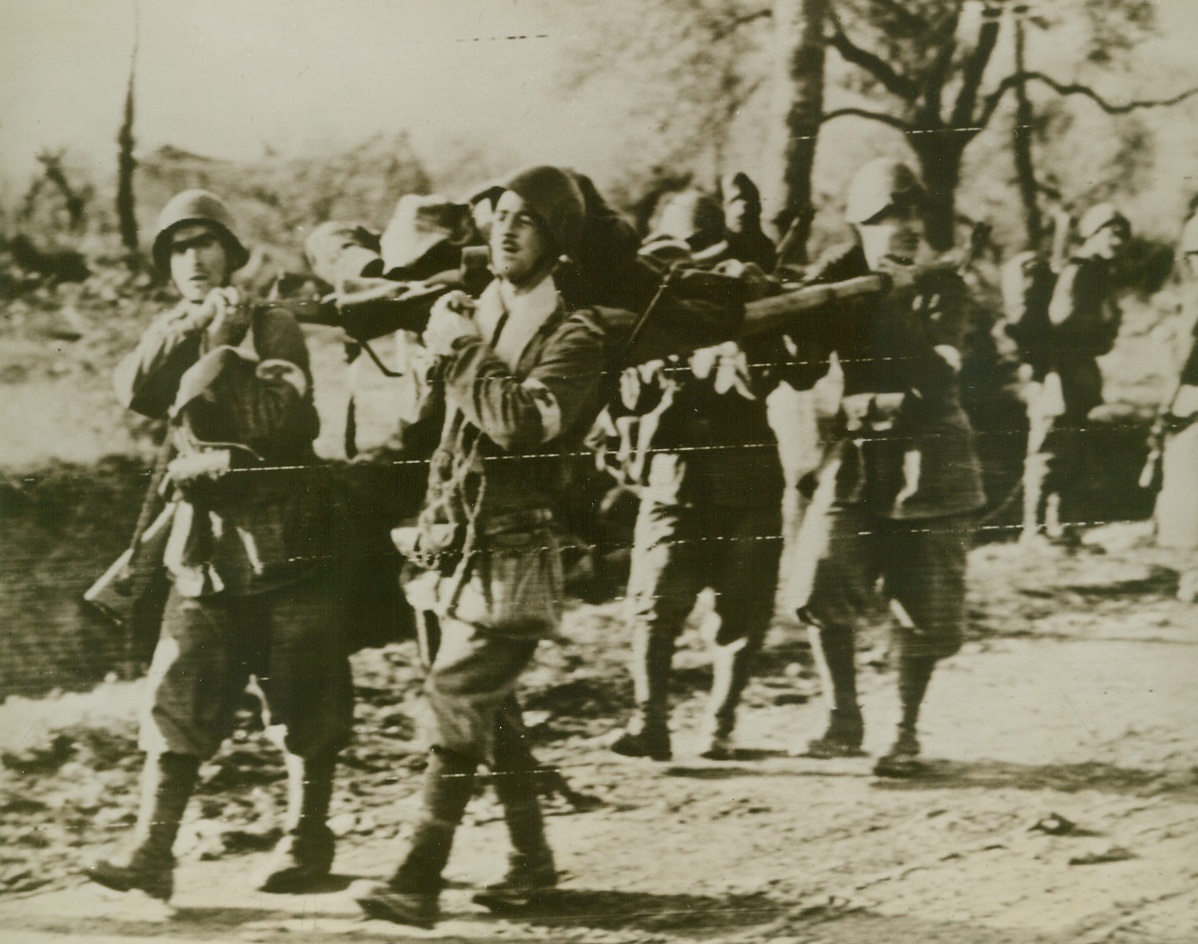 Wounded Italians Carried to Rear, 12/14/1943ITALY – Seriously wounded Italian soldier, injured in the first battle in which Italians went into action against their form Nazi allies, is carried to a rear dressing station by his comrades.Credit (Acme Photo by Sherman Montrose for the War Picture Pool, transmitted to the U.S. by Signal Corps Radiotelephoto);