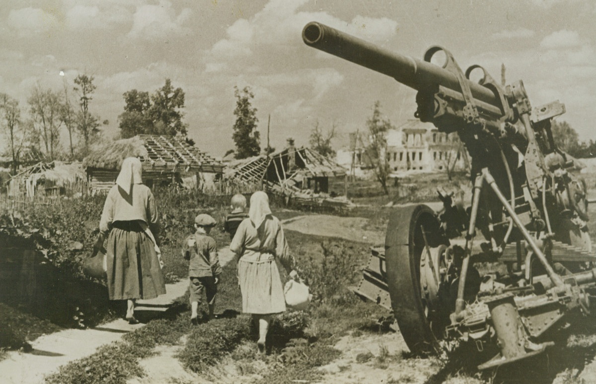 But It’s Still Home, 12/30/1943. Russia – They may find their homes reduced to a mound of bomb rubble, but these Russians walk with eager steps toward their town which was liberated by the Red Army on the Bryansk Front. The sound of the approaching Russian Army is a signal for Soviet civilians to crawl out of their huts and caves and return to their home towns which usually have been systematically destroyed by the Germans.Credit: ACME;