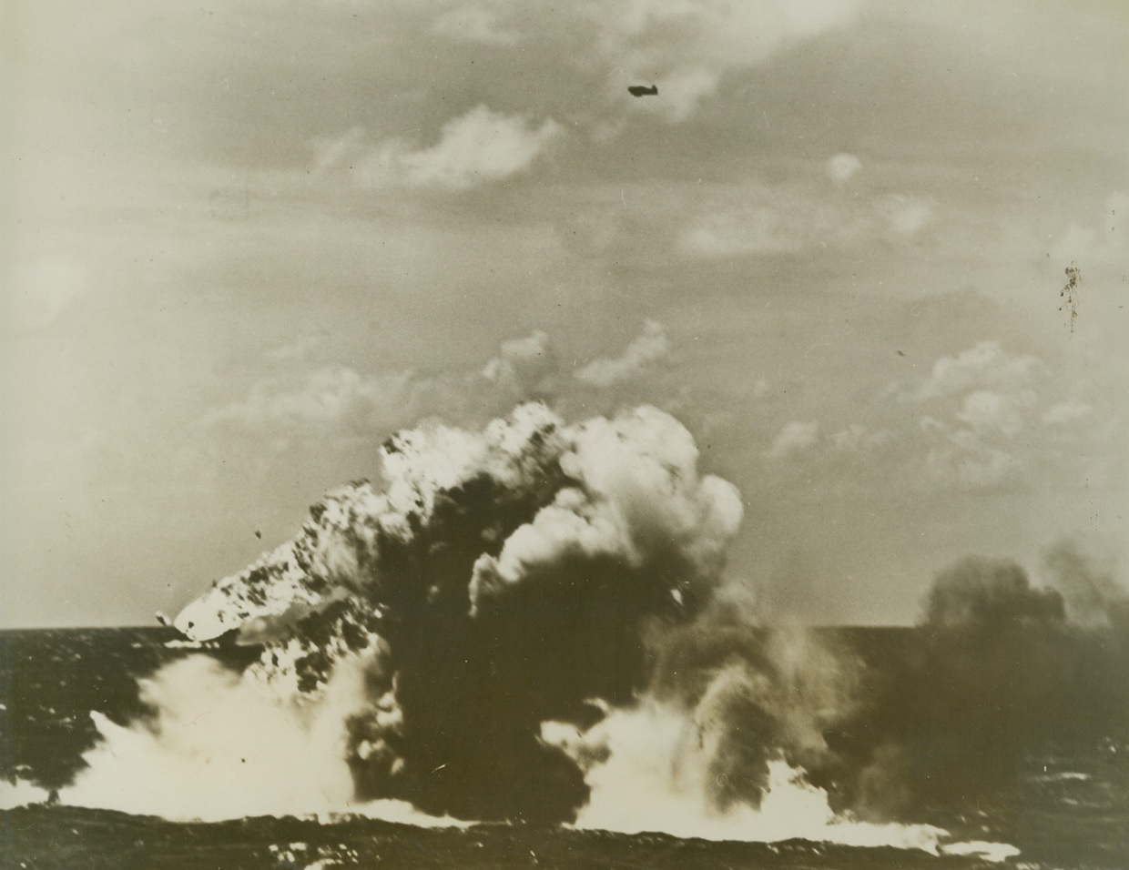 #2 – Splash and Roar as Jap Plane Hits Water, 12/13/1943. What was one of 72 enemy planes shot down in the December 4 U.S. aircraft carrier task force raid on the Marshall Islands, a Jap torpedo, explodes with a mighty roar of flame and smoke and water as hit hits the sea after being bagged by anti-aircraft fire. The bomber was one of six which tried to hit an American carrier. All were knocked down. Credit: Official U.S. Navy photo from ACME;