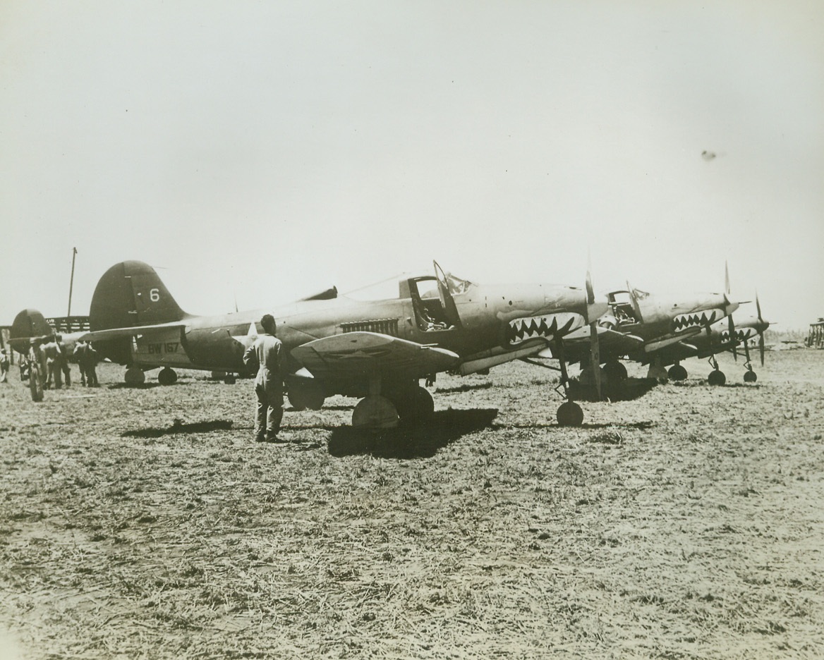 Bad Medicine for Japs, 10/20/1942. These cannon-armed P-39 U.S. Army Air Forces fighter planes are of the type that have combined with Navy and Marine planes to take a heavy toll of Japs in the battle of the Solomon Islands.  These speedy pursuit planes were photographed some time ago at the vital Guadalcanal air field.  Note shark-nose markings made famous by the American volunteer group in China.Credit Line (US Marine Corps photo from ACME);