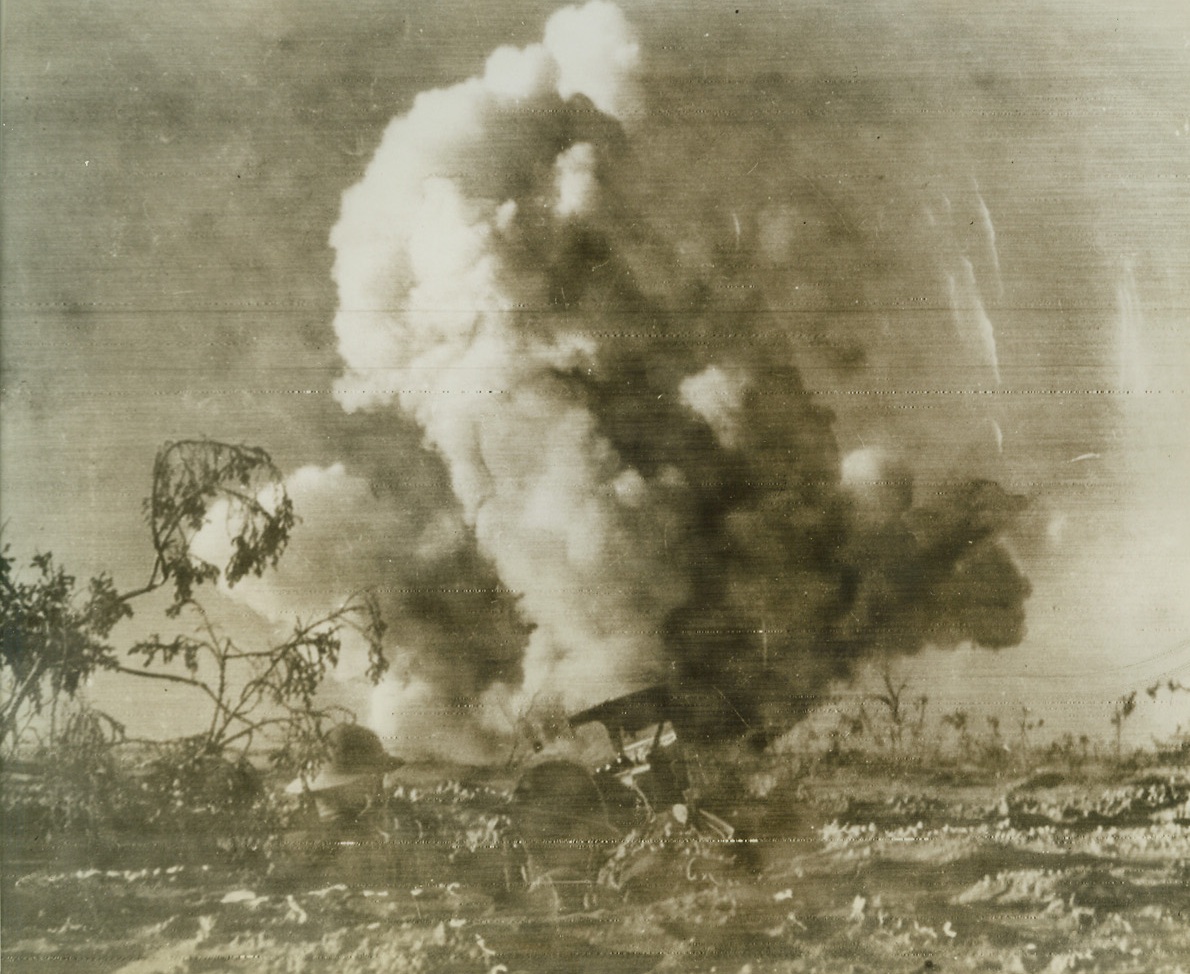 British Mortar Stands Heavy Fire, 10/28/1942. Western Desert – Heavy enemy fire harasses this British mortar in a newly taken position in the present allied offensive against Rommel in the Western desert.  The cameraman was close enough to catch the ear-splitting noise of the blast.  Photo radioed from Cairo to New York today. Credit line (ACME radio photo;
