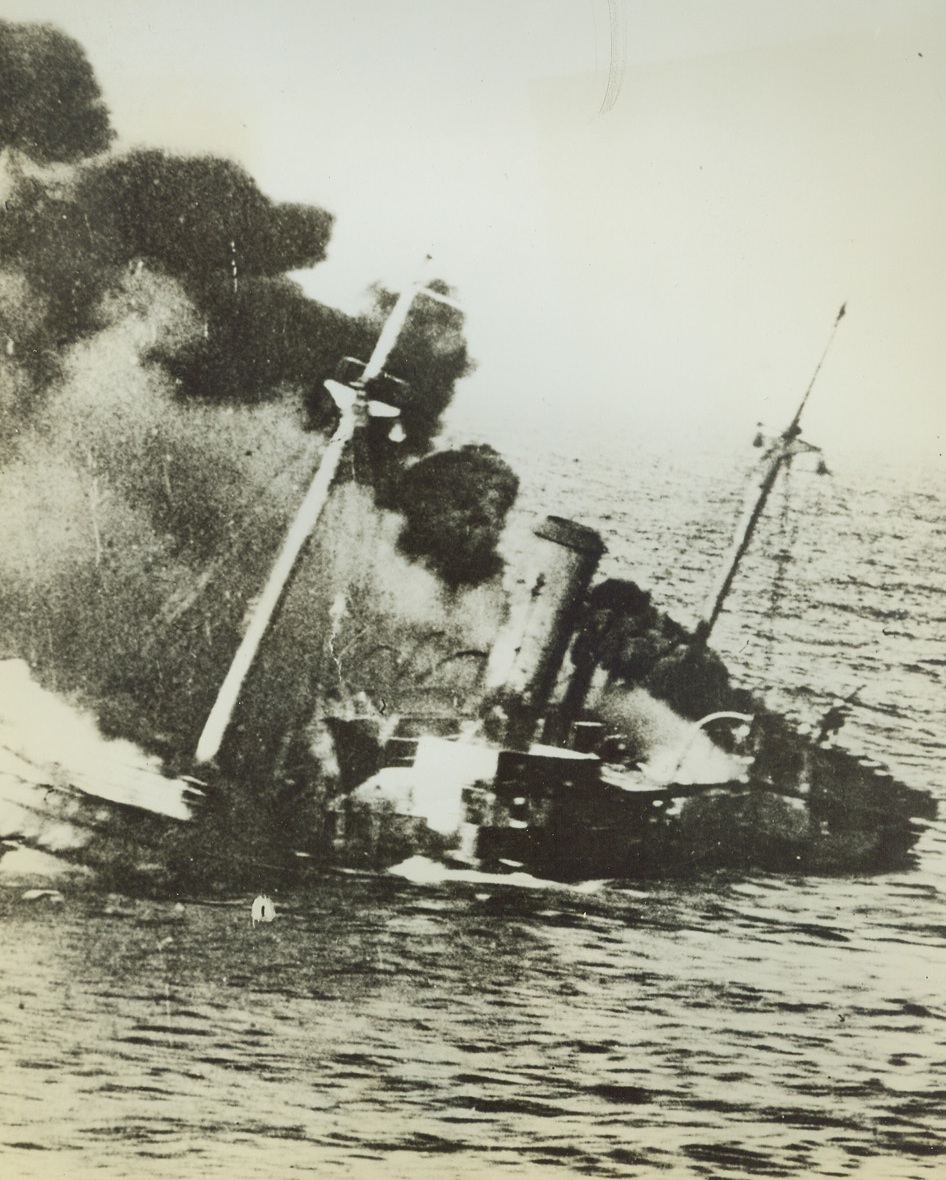 Destination: The Bottom of the Mediterranean, 10/3/1942. Here’s an Axis vessel that didn’t get to North Africa with supplies for Field Marshal Erwin Rommel. Ablaze from stem to stern and listing badly to port, she heads for the bottom of the eastern Mediterranean after being hit by RAF planes. Passed by British censor. Credit: ACME.;