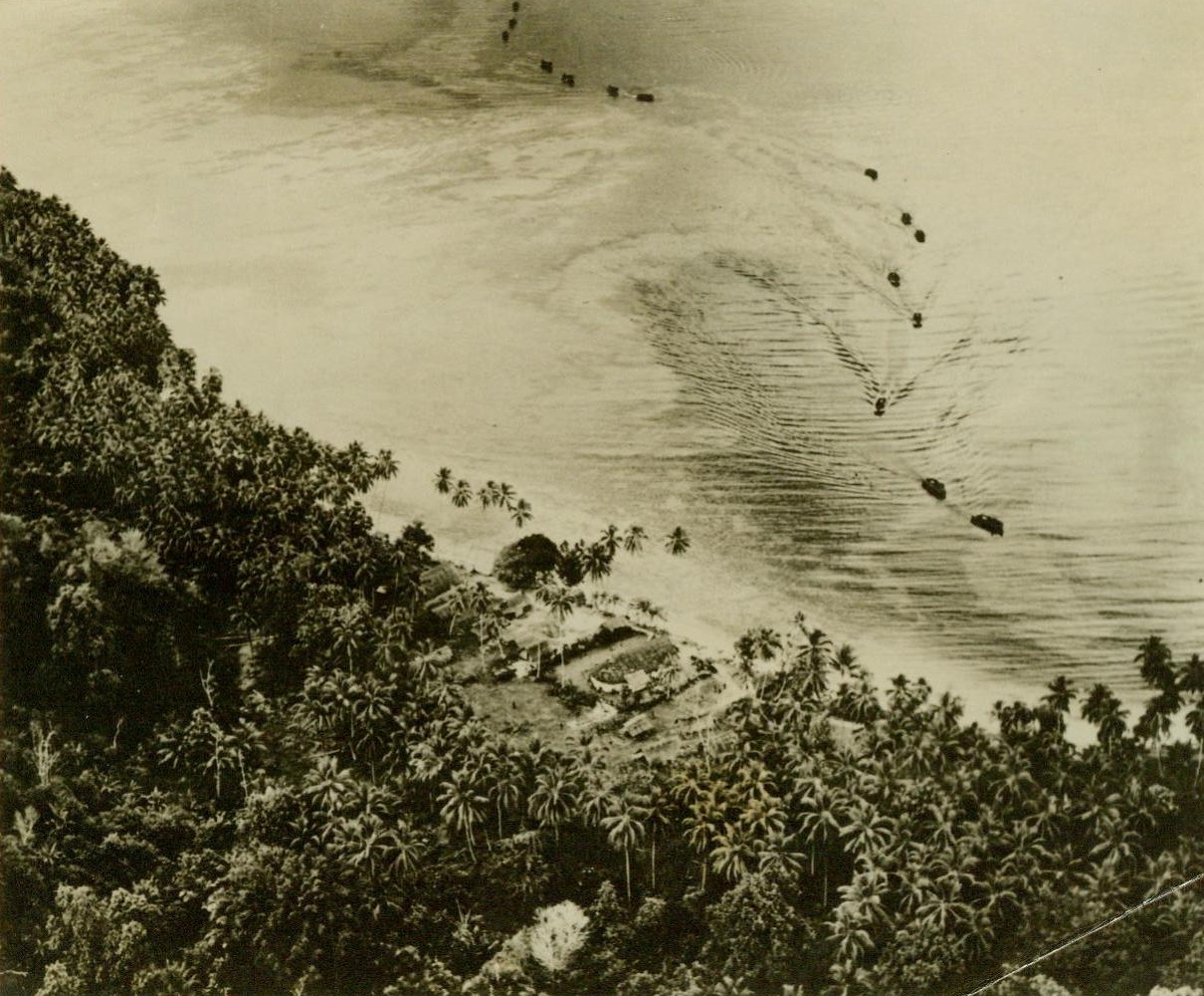 How the Marines landed, 10/17/1942. SOLOMON ISLANDS – Troop-carrying barges zig zag up to the beach of Florida Island to land the U.S. Marines in the initial stages of the Solomon Battle. The Marines occupied vital areas on both Florida and Guadalcanal and are now encountering heavy Jap attacks for the possession of the important Lunga Airport on Guadalcanal. CREDIT (Official US Navy photo from ACME) 10/17/42;
