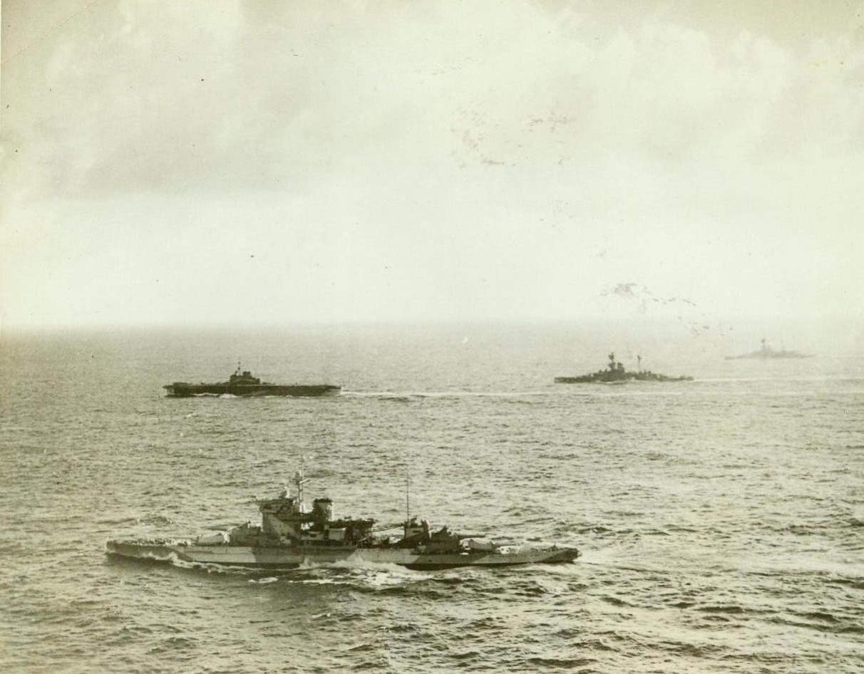 British Fleet in Indian Ocean, 10/23/1942. London -- The powerful British battle squadron in the Indian Ocean includes H.M.S. Warspite (nearest camera); H.M.S. Illustrious; H.M.S. Resolution and H.M.S. Royal Sovereign, viewed from a Fleet Air Arm Fighter. The announcement of the fleet’s presence in the eastern waters follow Gen. Sir Archibald P. Wavell’s declaration that Burma must be retaken from the Japs. Credit: ACME;
