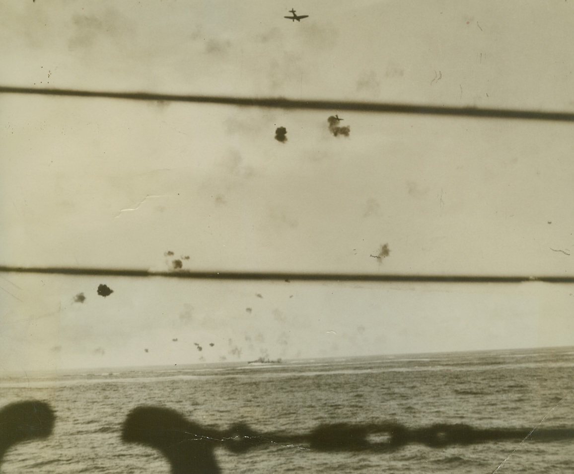 JAP BOMBERS IN ACTION, 11/30/1942. The camera caught these two Jap bombers as they passed over a U.S. carrier in the first phase of a triple bombing and torpedo attack on the carrier off Santa Cruz Islands in the South Pacific on Oct. 26th. Some 80 enemy planes attacked the carrier on that morning. Credit (Official US Navy Photo from ACME);