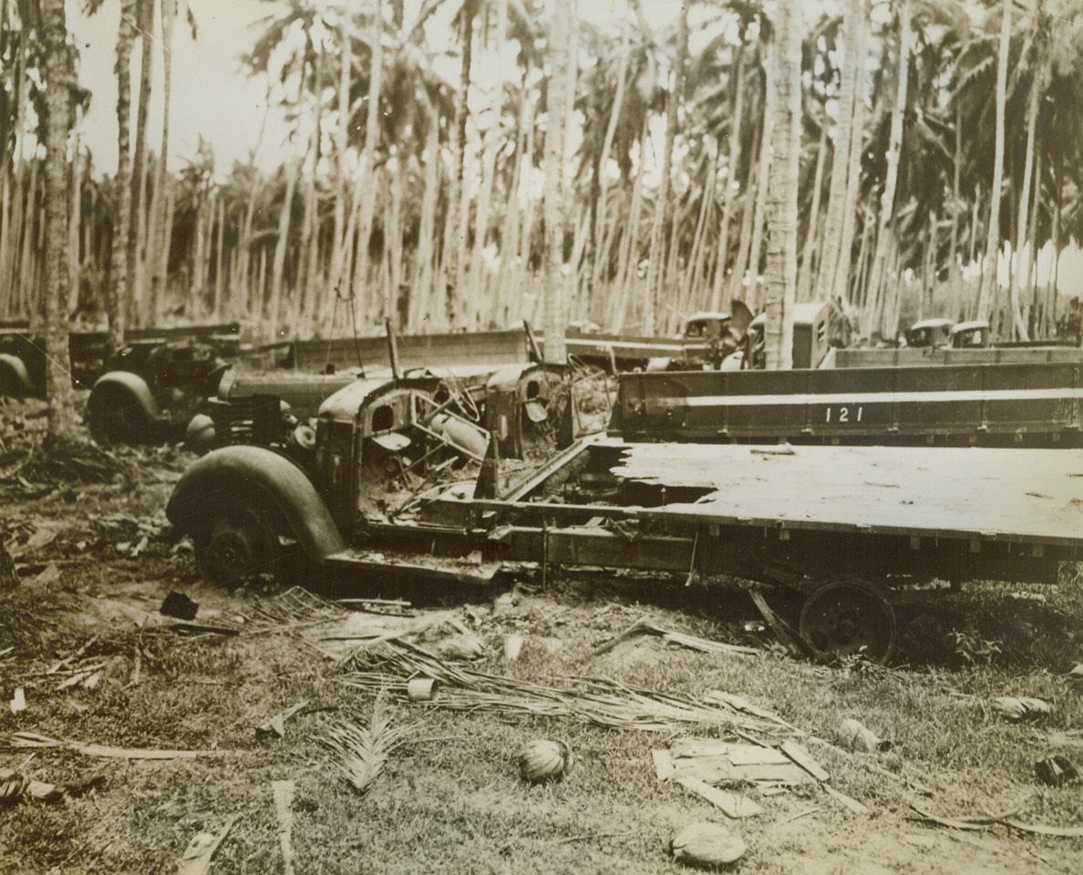 Stopped ‘Em Rolling, 11/7/1942. Guadalcanal – Accurate naval gunnery from U.S. ships lying off Guadalcanal shattered these Jap trucks during the early stages of the battle of the Solomons.  The truck in the foreground appear to have suffered a direct hit. Credit line (US Marine Corps photo from ACME);