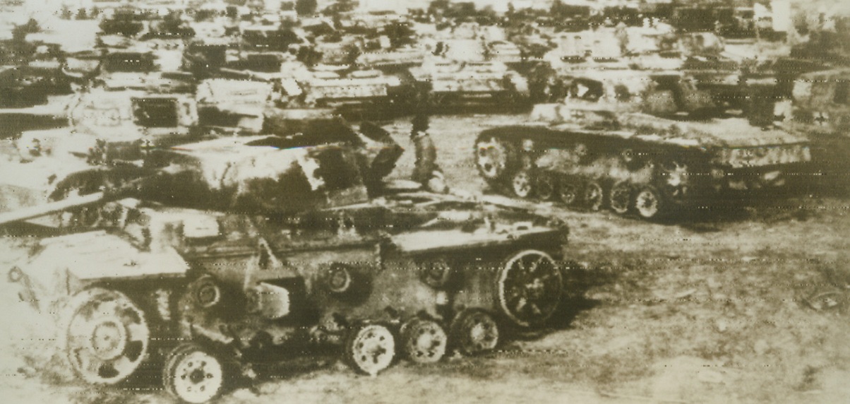 Scrap for the Red Army, 12/21/1942. STALINGRAD—These captured German tanks would make a good scrap collection for anybody’s war machine. They’re in the hands of the Red Army now and are shown massed on an open field near Stalingrad.Credit: ACME;
