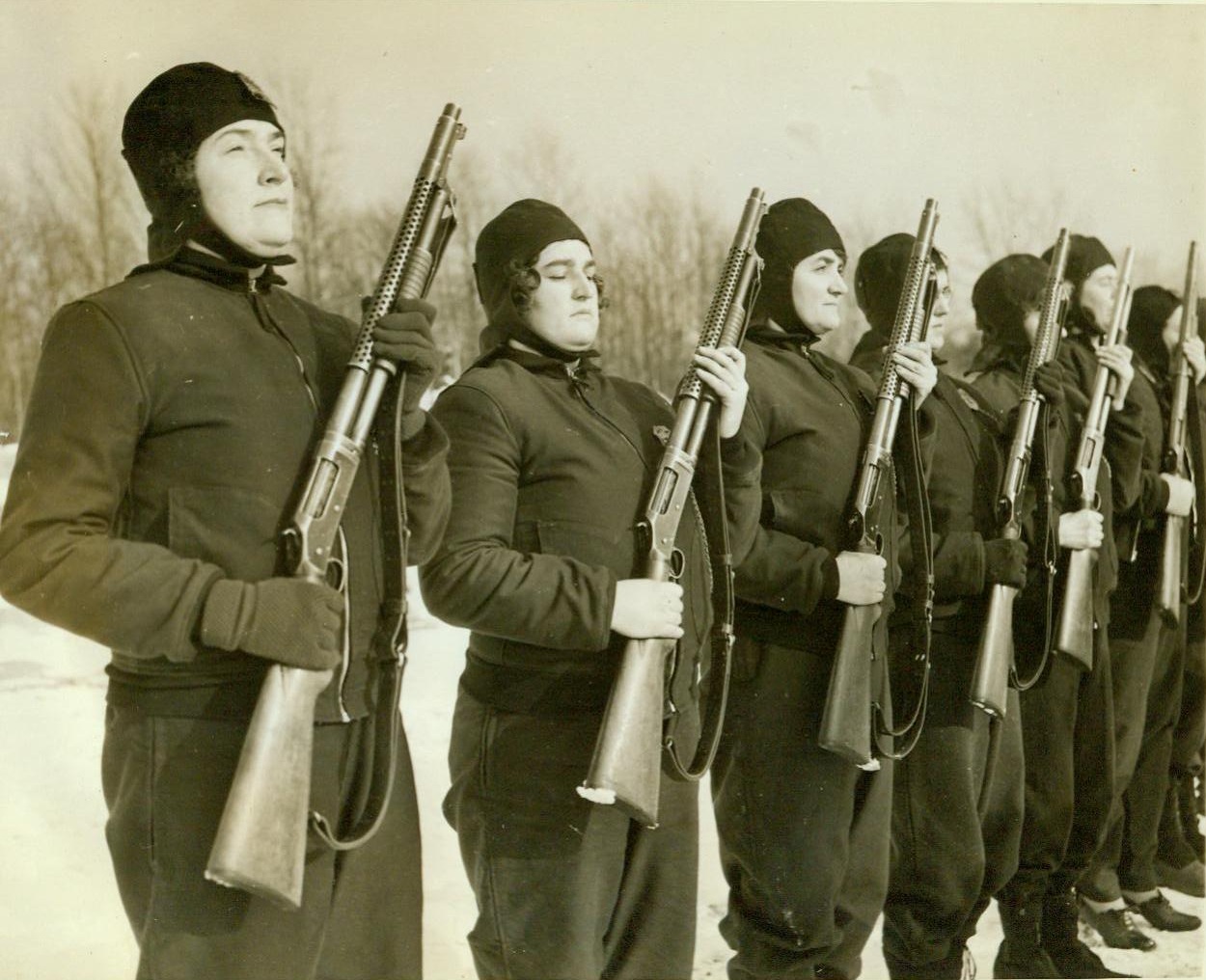 Guardians of Naval Air Station, 12/16/1942. South Weymouth, Mass:- Because they had the ability to pass a stiff civil service examination, these women were given the important task of Guarding the U.S. Naval Air Station at South Weymouth. They are the first civilian women assigned to such duties, and have released Marine and civilian male guards to more important tasks 12/16/42 (ACME);