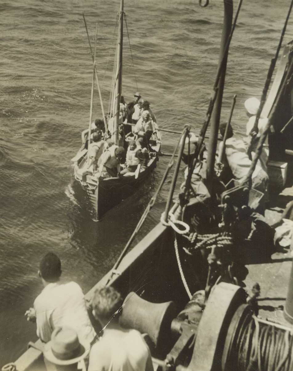 South Atlantic -- Merchant Vessel Crew Being Rescued After Losing Their Ship, 3/23/1942.
