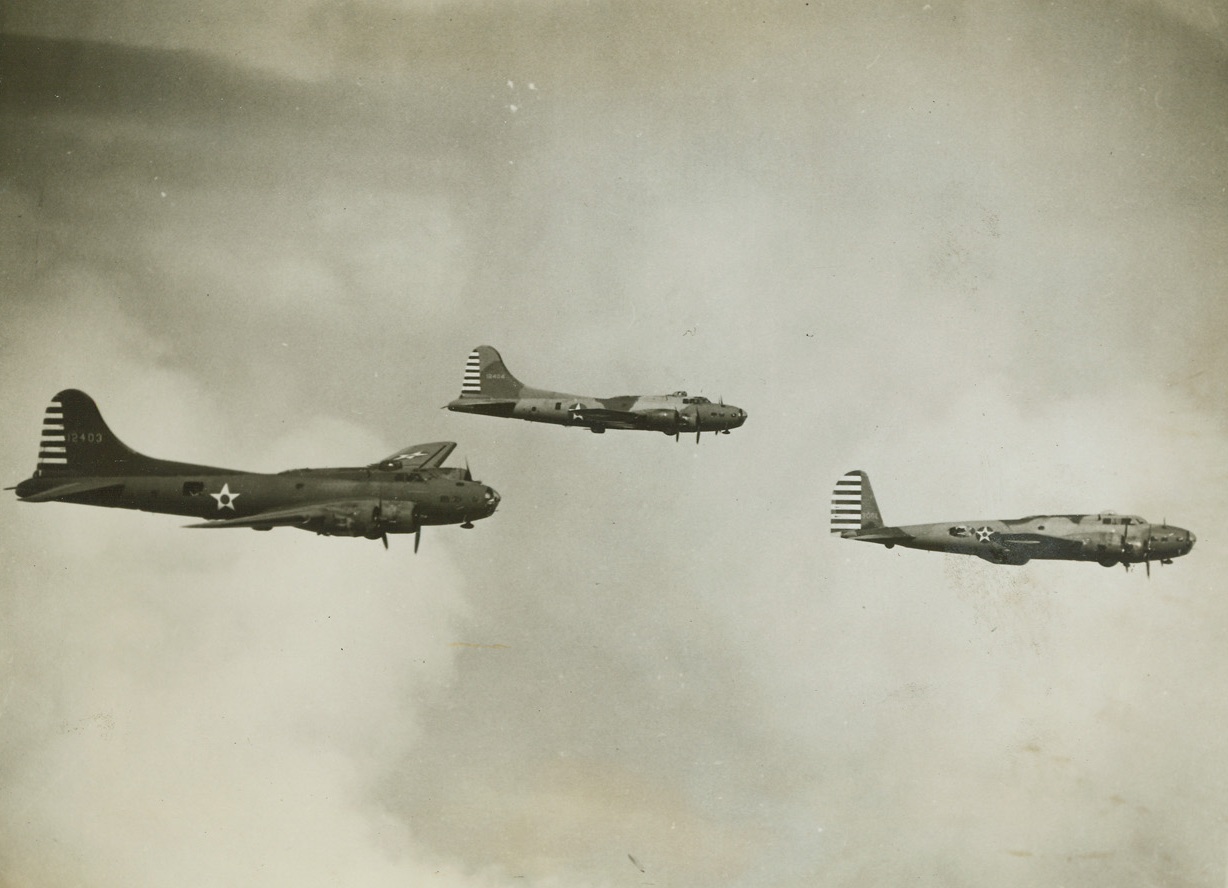 Defenders of Hawaii, 3/7/1942. Hawaii—A trio of powerful Flying Fortresses of the Hawaiian Air Force Bomber Command fly in formation over Uncle Sam’s vital Pacific defense outpost.Credit: ACME.;