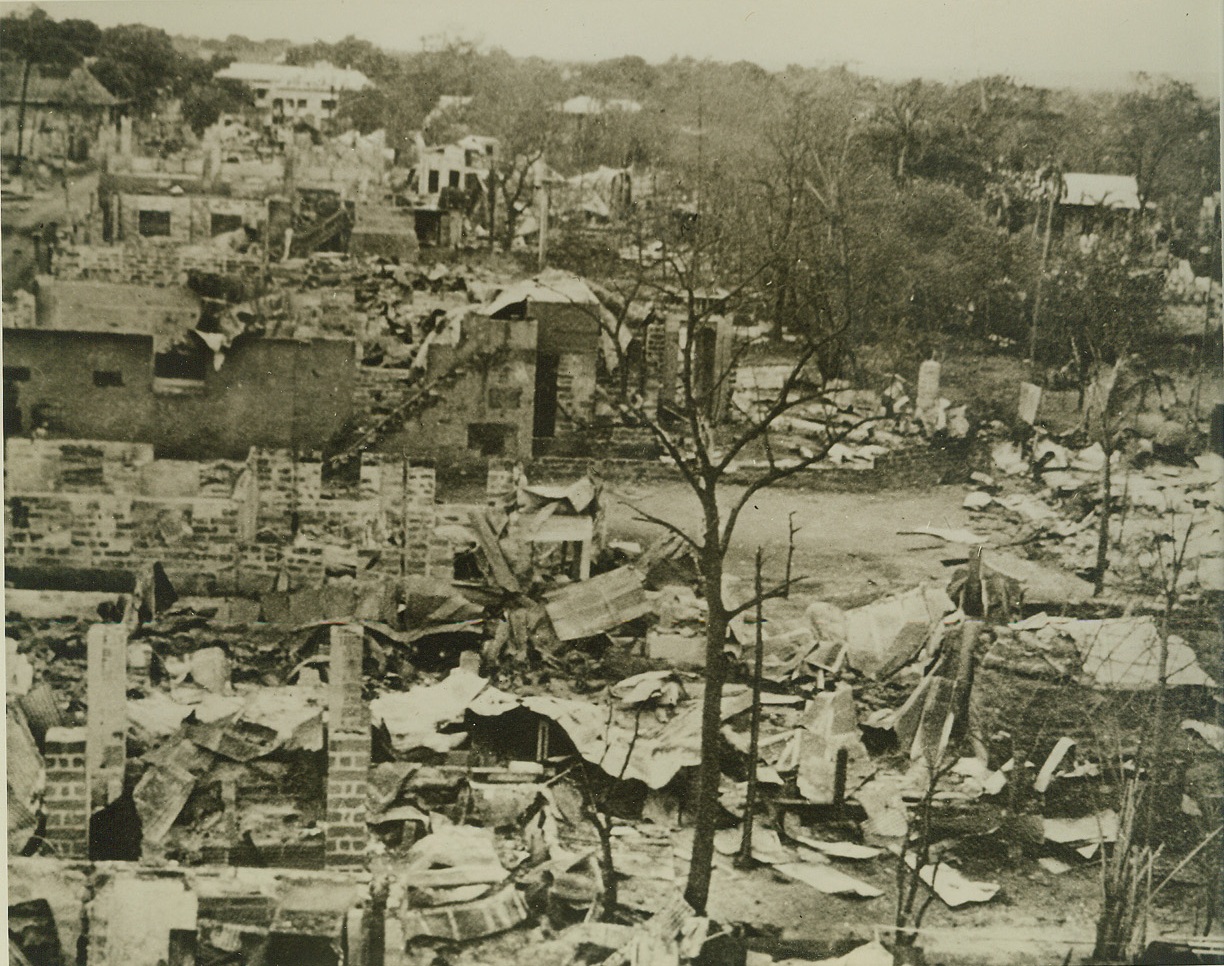 Jap Destruction of Bataan Peninsula Town, 4/9/1942. All that remains of a town on Bataan Peninsula – which is now entirely in Jap hands – after Japanese aerial bombs and shells from heavy siege guns, had completely leveled its houses and structures. This is one of the latest photos to come out of that battle area. Credit: (U.S. Signal Corps Photo from ACME);