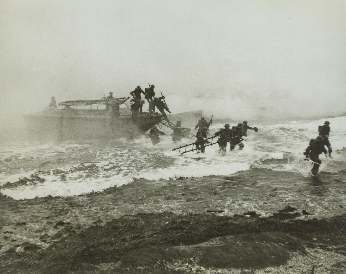 Invasion!, 5/18/1942. SCOTLAND—Carrying full equipment, arms, and ladders, troops of the Scottish Command, under cover of a smoke screen, ‘invade’ Scotland. The landing drill was witnessed by King George. Credit: ACME;