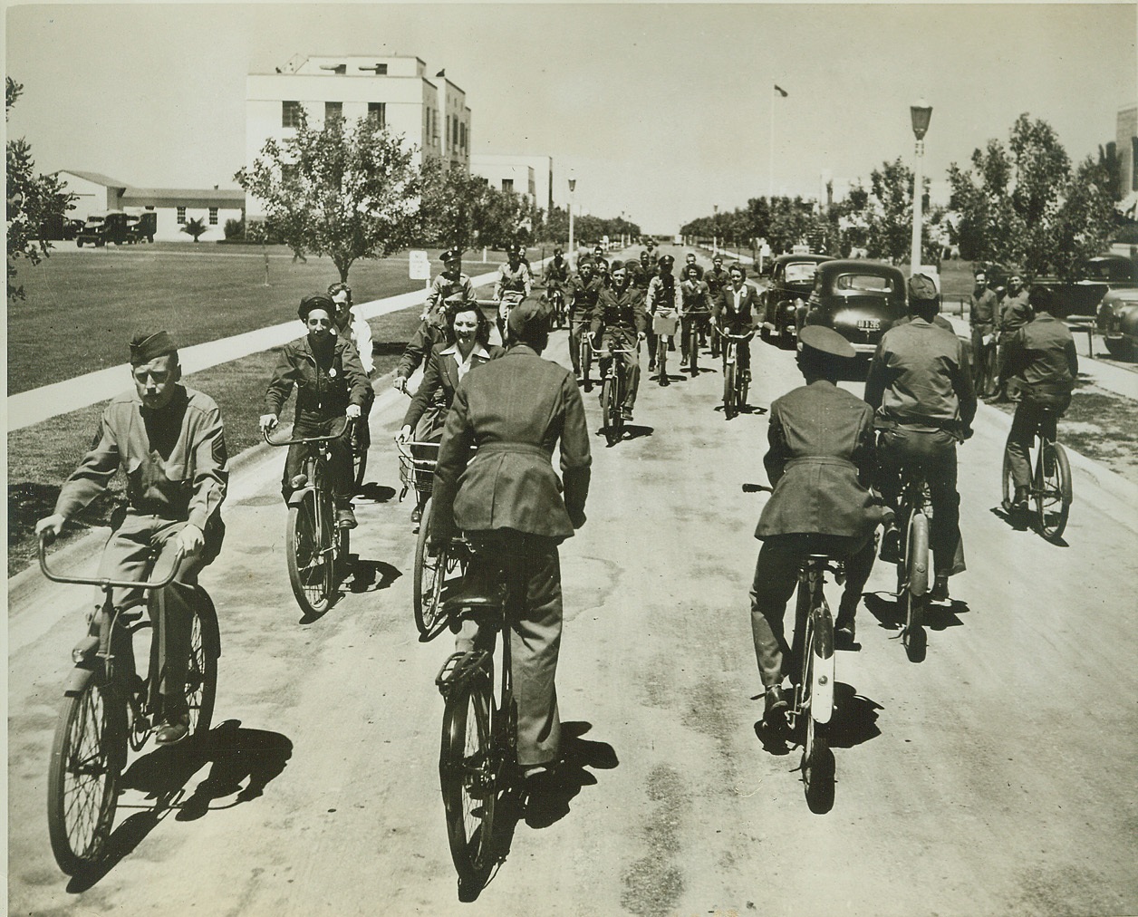 Uncle Sam’s Soldiers Conserve Gasoline, 5/7/1942. MC CLELLAN FIELD, CALIF. – America’s fighting men at the Sacramento Air Depot are “all out” in their effort to help Uncle Sam conserve rubber, gasoline and oil. Every available bicycle in this region was bought up by the military personnel and by thousands of civilian war workers immediately after Pearl Harbor. Here, Officers, enlisted men, and civilian employees ride their bikes to posts and to their work in the new “victory” fashion. Credit: (U.S. Army Signal Corps From ACME);