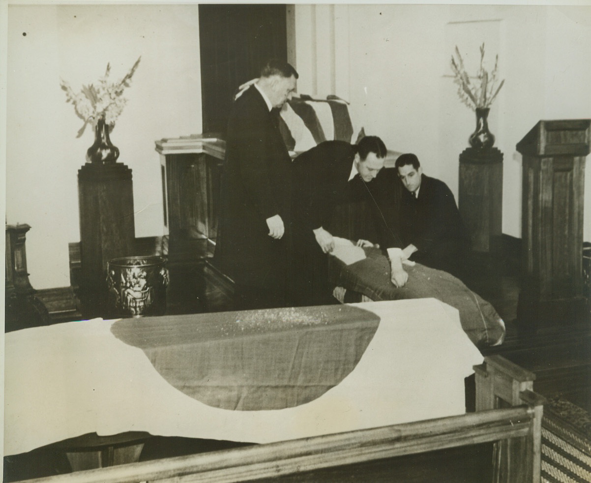 NAVAL HONORS ACCORDED JAPANESE, 7/26/1942. SYDNEY, AUSTRALIA – Coffins containing the bodies of four Japanese who lost their lives in a submarine attack on Sydney Harbor, May 31, are draped with the flag of their country as they lie in a chapel in Sydney. The dead sailors were accorded naval honors and their bodies cremated. Credit: ACME;