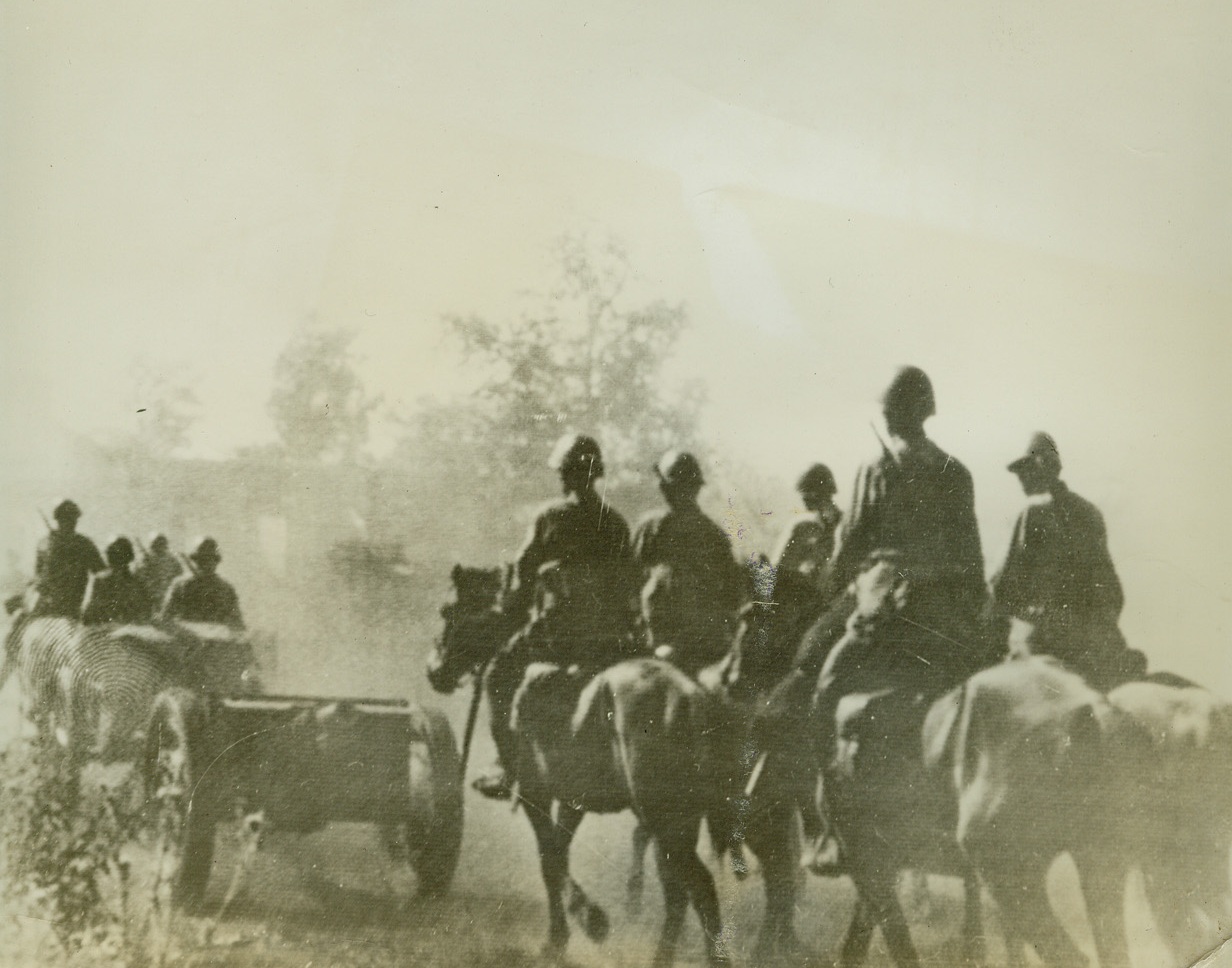 Russian Artillery Moves Up at Stalingrad, 8/30/1942. RUSSIA—A Soviet horse artillery unit enters a village northwest of Stalingrad where, according to the latest reports, August 30, Russians have successfully counter-attacked in great mechanized battles against invading Germans. The enemy is also reported to have been pushed back before the city. Photo was radioed from Moscow to London and was received in New York by clipper. Passed by censors.Credit: ACME;