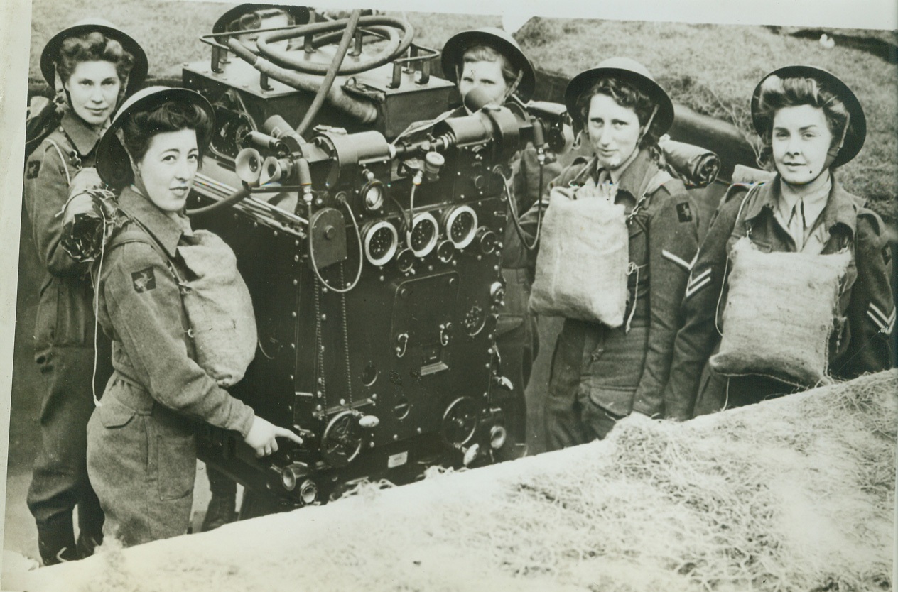 Their Aim is Good, 8/14/1942. England – This is the predictor team of a mixed anti-aircraft battery on the east coast of England which destroyed three enemy raiders within 48 hours. Credit: (ACME);