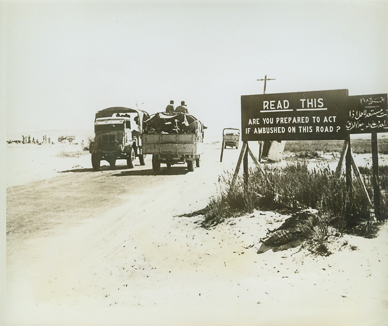 WARNING, 8/3/1942. EGYPT – This sign is prominently displayed at a road junction near the Egyptian battle zone. Credit: ACME;