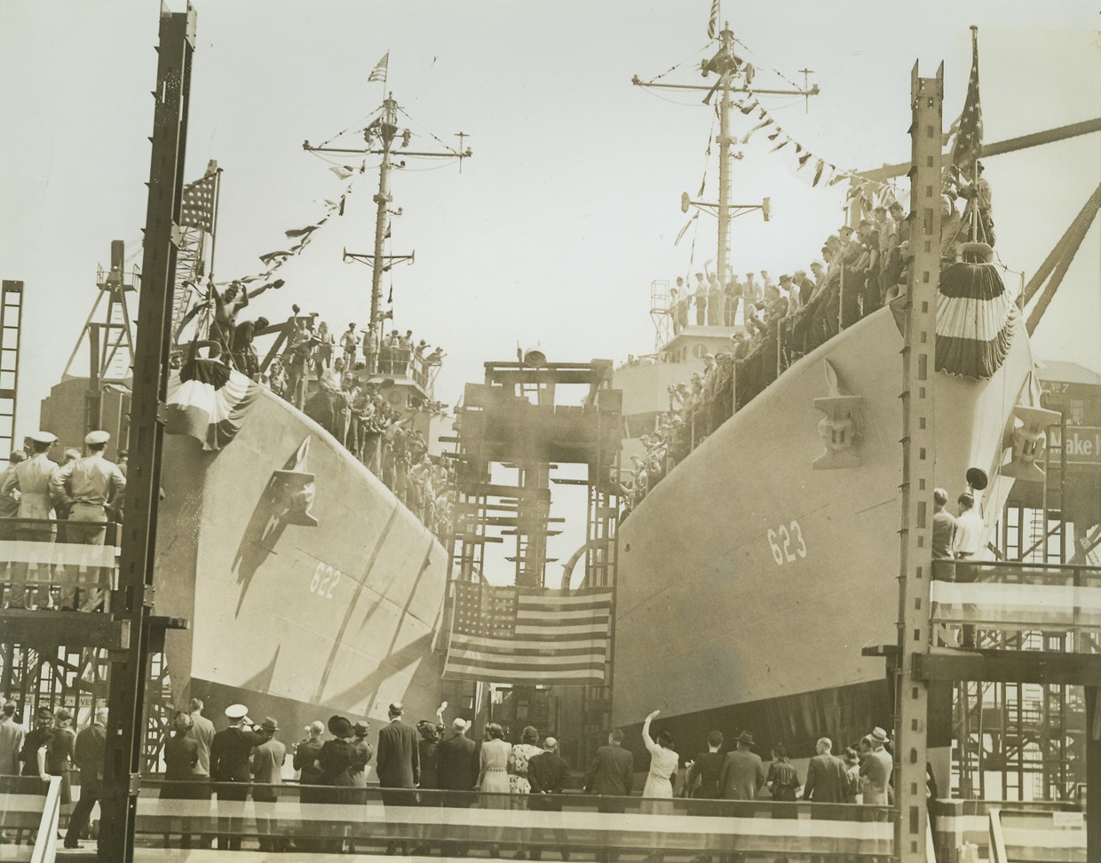 Two Destroyers Launched at Kearny, 9/15/1942. Kearny, N.J. – The U.S.S. Maddox, named in honor of the late Capt. William A. T. Maddox of the Marine Corps, slides down the ways at the Federal Shipbuilding and Dry Dock Company Yards Sept. 15. The U.S.S. Nelson, which was launched a few minutes later, can be seen on the right. Credit: ACME;
