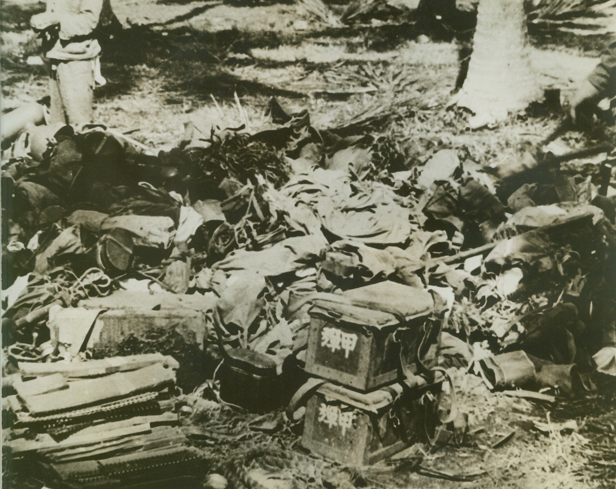 LOOT FROM THE JAPANESE, 9/22/1942. GUADALCANAL, SOLOMON ISLANDS—A large pile of military equipment and stores captured by the U.S. Marines in the hot action on Guadalcanal Island, recently. Ammunition belts can be seen in left foreground. Credit: Acme;
