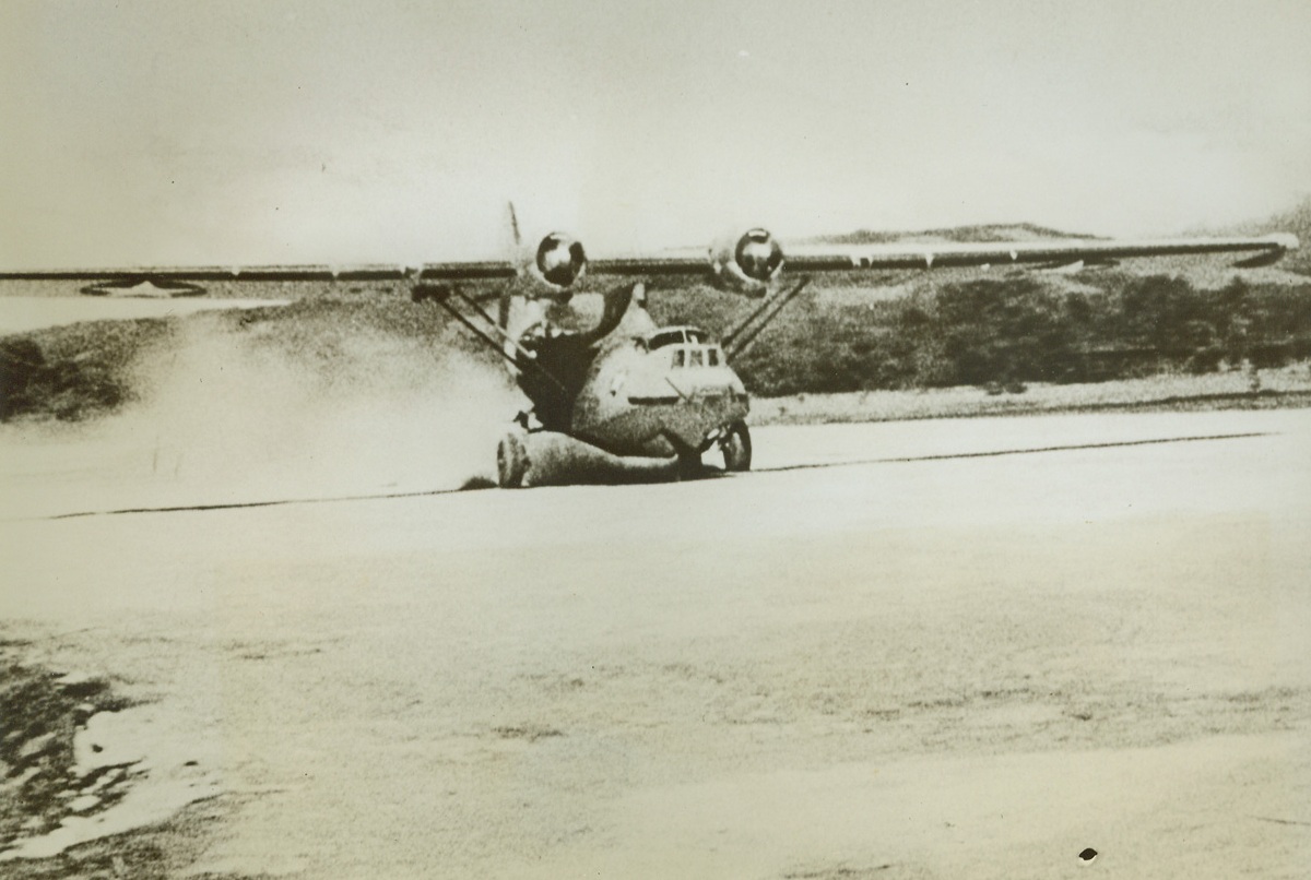 Squatter’s Rights, 9/8/1942. SOLOMON ISLANDS—The first U.S. plane to land after the capture of a beautiful Jap-built air field on Guadalcanal rests on the field’s mile-long runway. The plane, taking possession, is an amphibian patrol bomber. Credit: U.S. Marine Corps photo from News of the Day supplied by ACME;