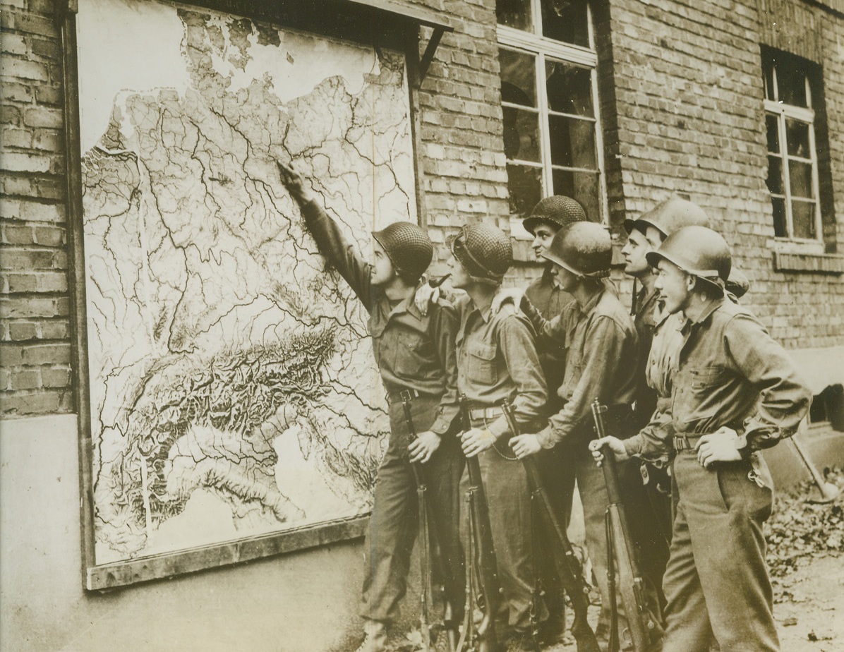 GERMAN MAP AIDS AMERICANS, 11/10/1944. GERMANY—A German map, set up on the side of a building in a captured German town, serves as a guide to the American soldiers now fighting within Germany. Credit: Acme;