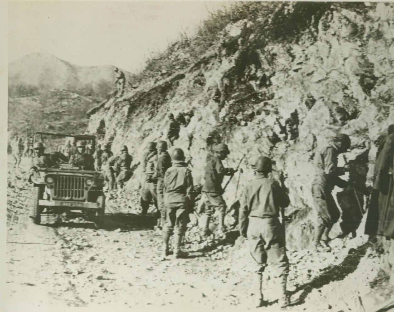 French Engineers Repair Road, 1/20/1944. Italy – French Army Engineers of the Allied 5th Army, clear dirt and debris from a road in Italy bombed by the Germans in an attempt to block the Allied advance. Today, it was announced that 5th Army troops had captured the important communications center of Minturno, North of the Garigliano River.  Credit: (ACME photo via Army Radiotelephoto);