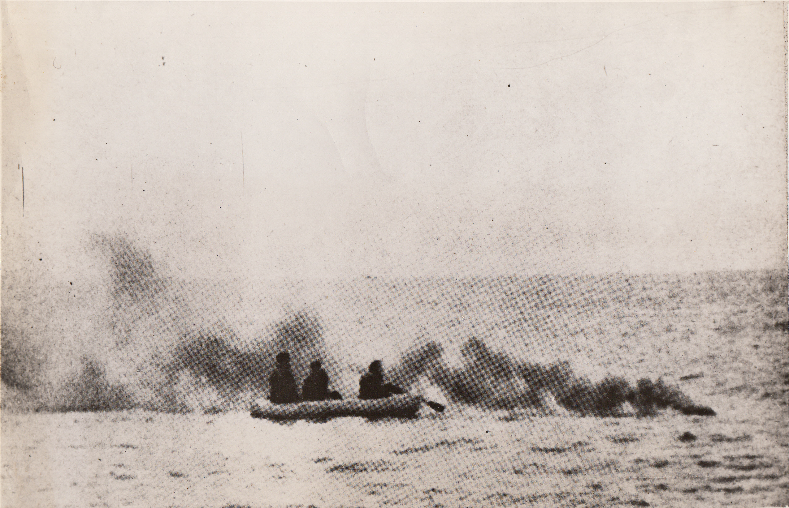 Yanks, Say the Nazis, 1/27/1944. At Sea—The German Caption, accompanying this photo received through a neutral source, says these men (?) a life raft are American Airmen rowing away from the burning wreckage of their sinking plane. Shortly afterward, they were picked up by a Nazi seaplane.;