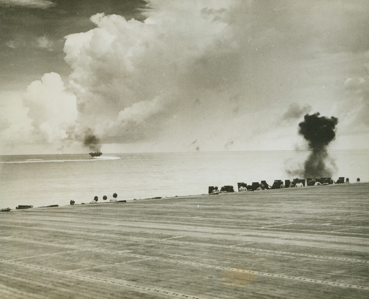 Bye, Bye, Zero, 1/18/1944. At Sea – One puff of thick black smoke marks the watery grave of a Jap zero, shot down along with 63 other enemy planes during a savage counter attack on the U.S. task force that raided Rabaul on November 11, 1943.  Destroying that great number of war birds, our carrier task force demonstrated its power – proving that outfits of this kind pack a tremendous wallop. Credit line (Official U.S. Navy photo from ACME);