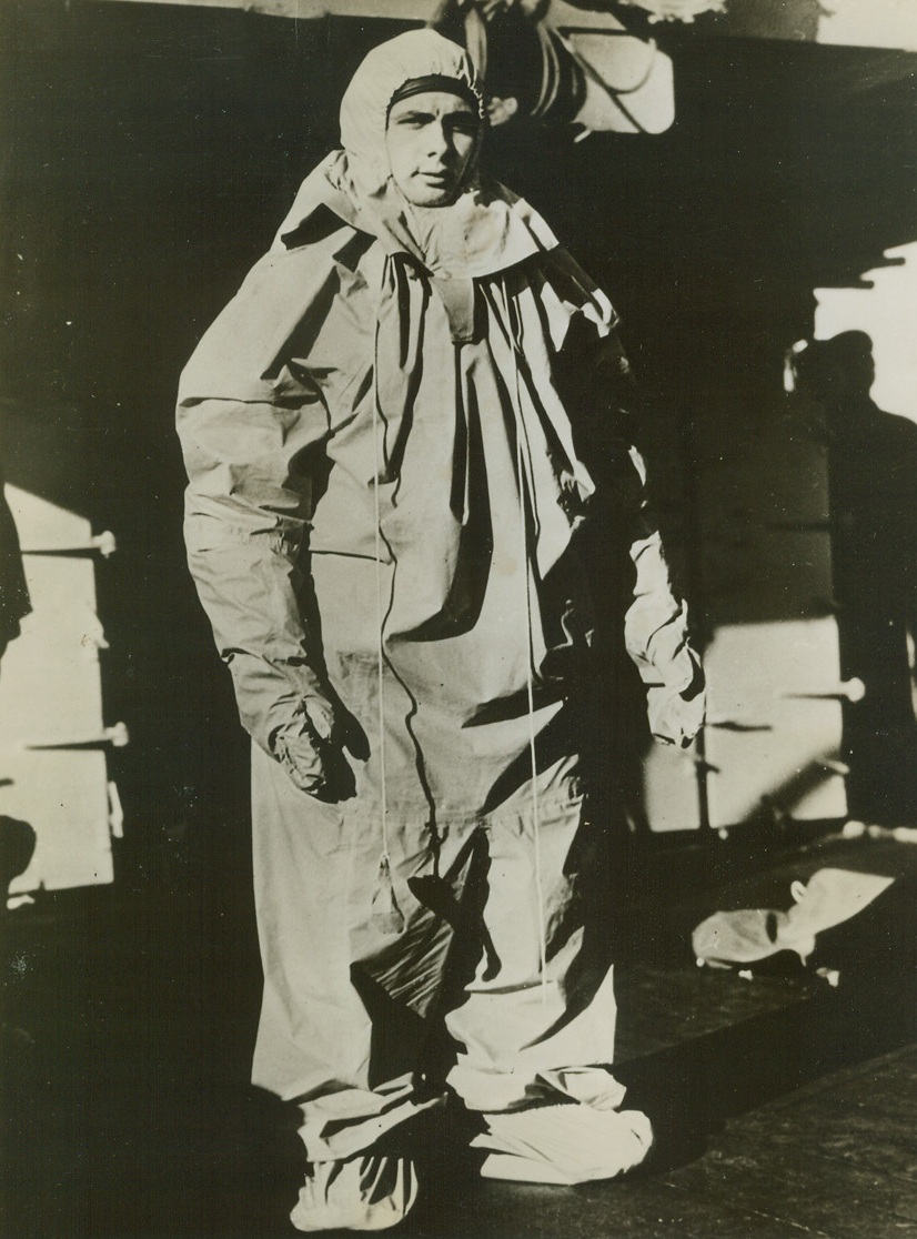 Dressed for an Icy Dunking, 1/6/1944. Recent tests proved that the lightweight exposure suit worn by this PCAF flier will increase the chances of survival of an airman brought down in icy seas. This pilot got a dunking in the Canadian-Atlantic and was able to float comfortably for hours, while his companions who wore only ordinary pilots’ clothing or sheepskin suits had to holler for “rescue” almost immediately. A joint U.S.-Canadian air-sea committee conducted the tests in 40 degree water. Credit: Army Air Force photo from ACME;
