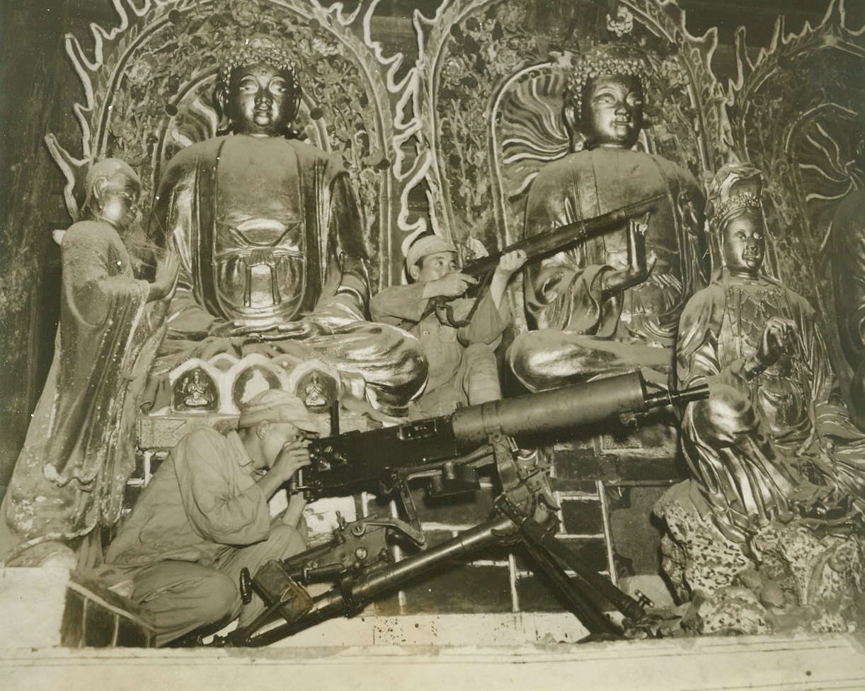 No Title. 10/4/1944. An ancient Chinese temple, ornamented with massive, costly idols, serves as a position for these Chinese warriors.  Credit Line—WP—(ACME);
