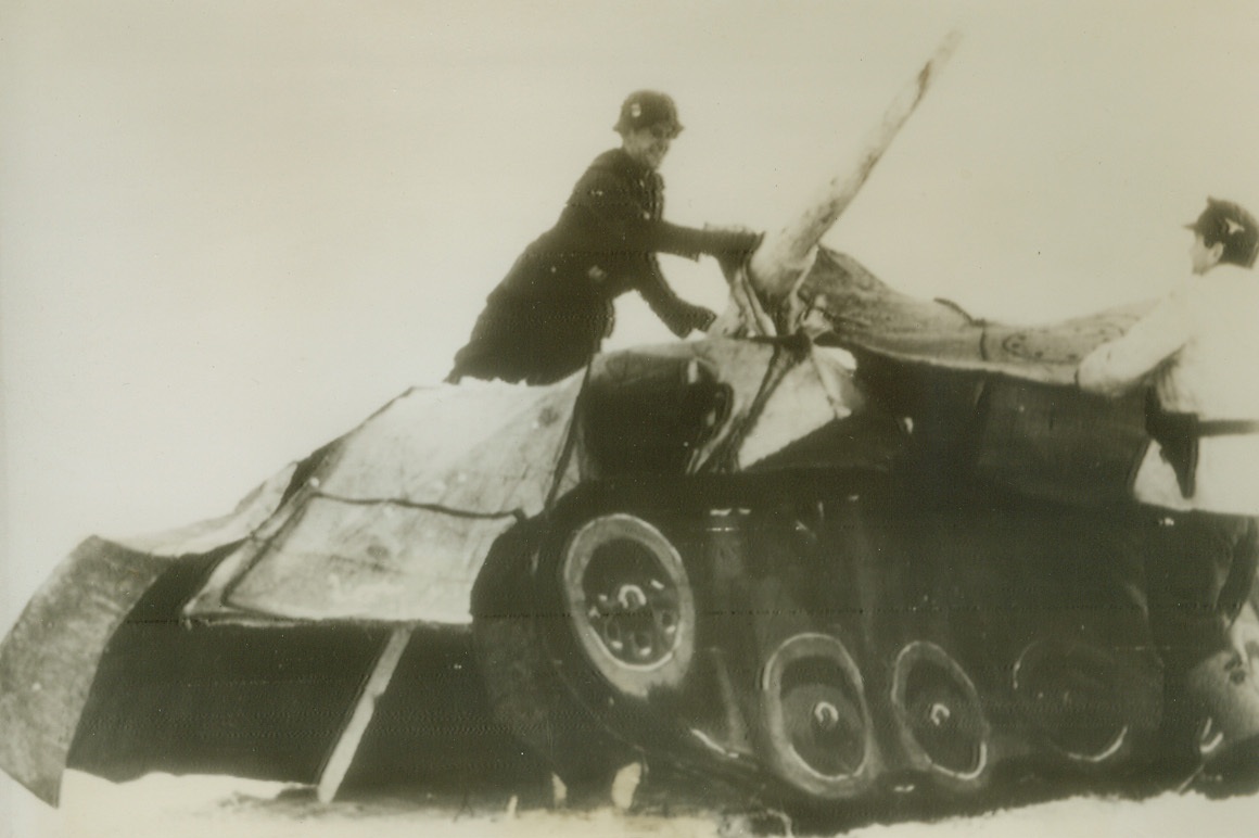 Joke’s On Them, 2/22/1944. RUSSIA—A German soldier can afford to smile as he discovers that a Russian “tank” is a dummy fashioned of wood and canvas. According to the Nazis, who wish that all Russian war machines were made of similar substance, whole fields of the dummy tanks were discovered at Pogrebichtche. Radioed from New York to Stockholm today.Credit: ACME;