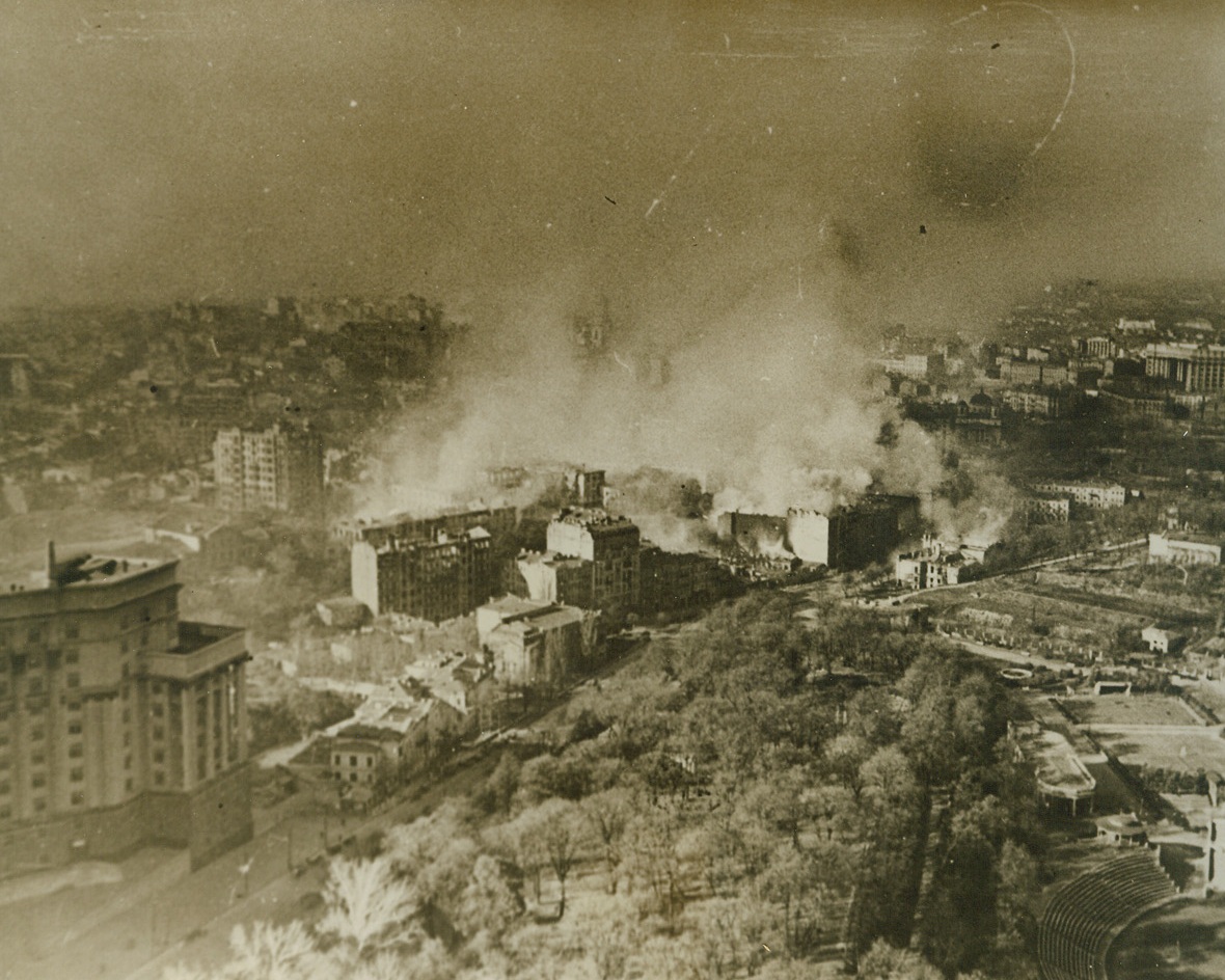 As Germans Retreated from Kiev, 2/9/1944. This photo, just released in the United States, shows the central part of the Russian city of Kiev burning after Nazi demolition and incendiary squads carried through their “scorched earth” orders before retreating in the face of powerful Soviet forces. Passed by censors.Credit: ACME;