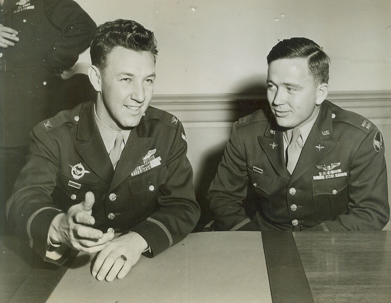 No Title. 2/24/1944. Col. Keith Compson, left, commanding officer of a B-24 heavy bombardment group now operating in the Mediterranean theater, and Capt. Daniel B. Orr, right, operations officer in the group, who combined have compiled a record of almost 700 hours of operational combat flying, are shown during a press conference at the Pentagon Building today. Col Compton, 28, is of St. Joseph, Mo., and Capt. Orr who is 24, is from Graham, Texas.  Credit: ACME.;