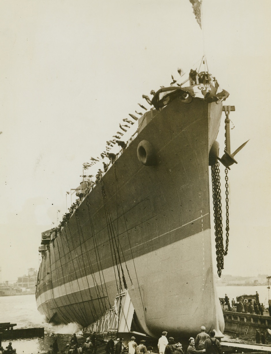 Cruiser Atlanta Launched, 2/6/1944. Camden, N.J.—The Cruiser Atlanta, fourth Naval vessel to bear that name, goes down the ways of the New York Shipbuilding Corp. at Camden, after its christening today (Feb. 6th). Mrs. Margaret Mitchell Marsh, author of “Gone with the Wind,” sponsored the vessel for which citizens of Atlanta raised $63, 387, 879 in war bond sales after the third ship of the same name was sunk off Guadalcanal. Mrs. Marsh also sponsored the third Atlanta. Credit: Official U.S. Navy photo from ACME.;