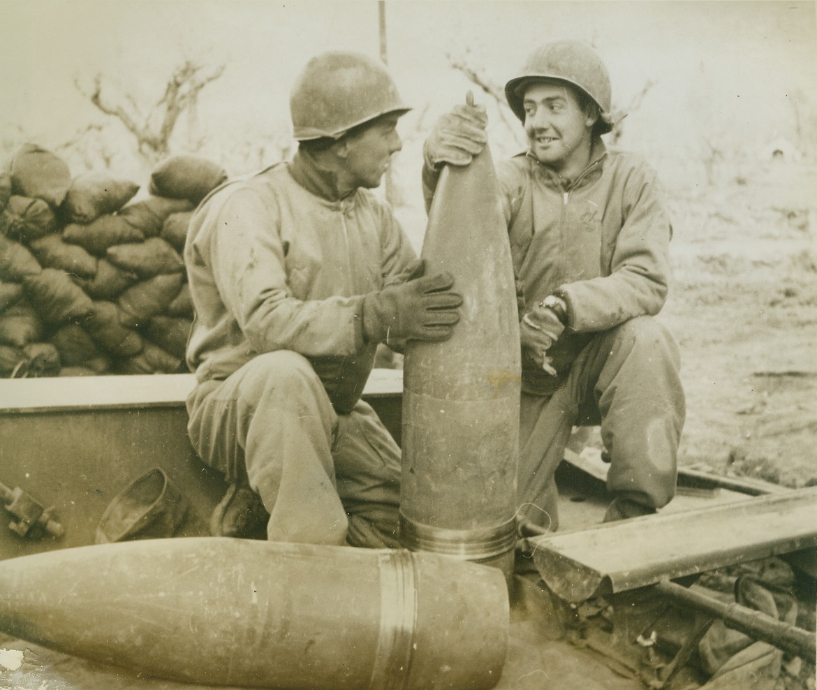 Nazi-Busters, 3/5/1944. ITALY – Each shell for the Army’s new 240 mm. Howitzer is a 345-pound headache for the Germans in Italy where the giant field piece is being used for the first time. Two Pennsylvanians, Pfc. Henry Maracsky (left) of McAdoo, and Pvt. John A. Rochm, of Philadelphia, examine a pair of the heavy shells. Credit Line (Acme);