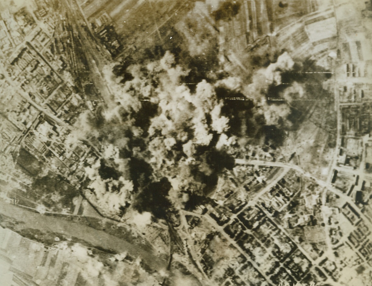 One-Two Bombing Technique, 4/16/1944. GERMANY -- Using a boxer's system of hitting his opponent with successive blows so that he does not have a change to recover from the first blow, the Eighth Air Force returned to Schweinfurt on April 13th to stop rebuilding efforts on ball bearing plants there after the February raids. The Flying Forts met heavy enemy opposition. Credit (Signal Corps Radiotelephoto from ACME);