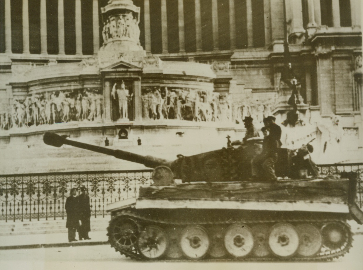 Nazi Tank in Rome, 4/5/1944. ROME – Passersby stop to stare as a huge tank, manned by Nazi personnel, rumbles through the streets of Rome, according to the German caption received with this photo. Picture was obtained through a neutral source.Credit Line (Acme);