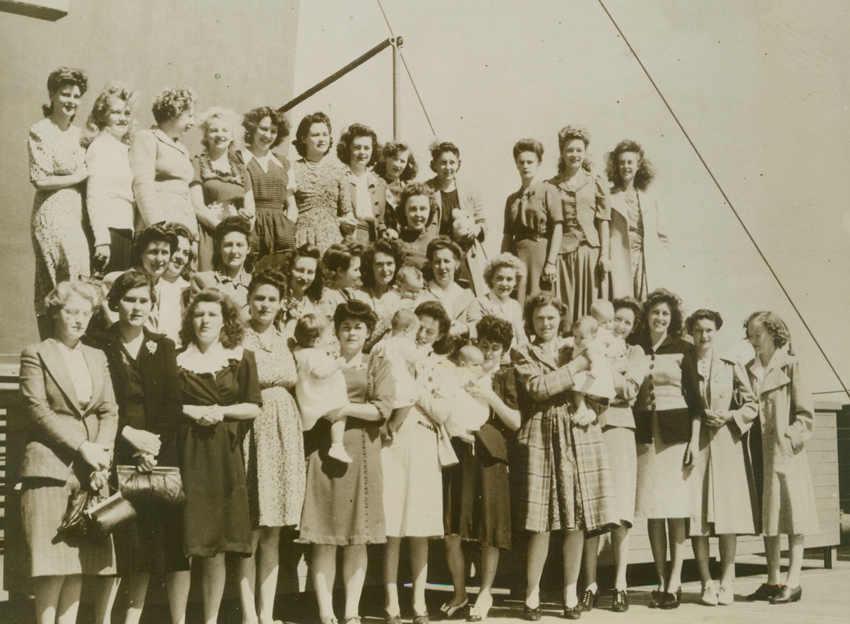 Stormy Strifes—Wives to You, 4/19/1944. AUSTRALIA – This large group of little ladies is composed entirely of Australian wives of American servicemen—some with babies. The girls are shown on a ship leaving an Australian port for the United States. Marriage to servicemen does not confer citizenship on the women. Credit: ACME;