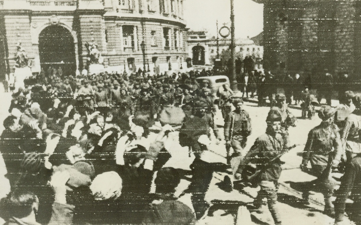 Russian Troops Free Odessa, 4/17/1944. ODESSA - It was a joyous mass of civilians which greeted Soviet forces when they stormed Odessa on the Black Sea, sending Axis troops on the run into lower Pessarabia. In 19 days of fighting, the Russians killed 26,000 troops and captured 10,680, in addition to masses of German equipment destroyed or captured.;