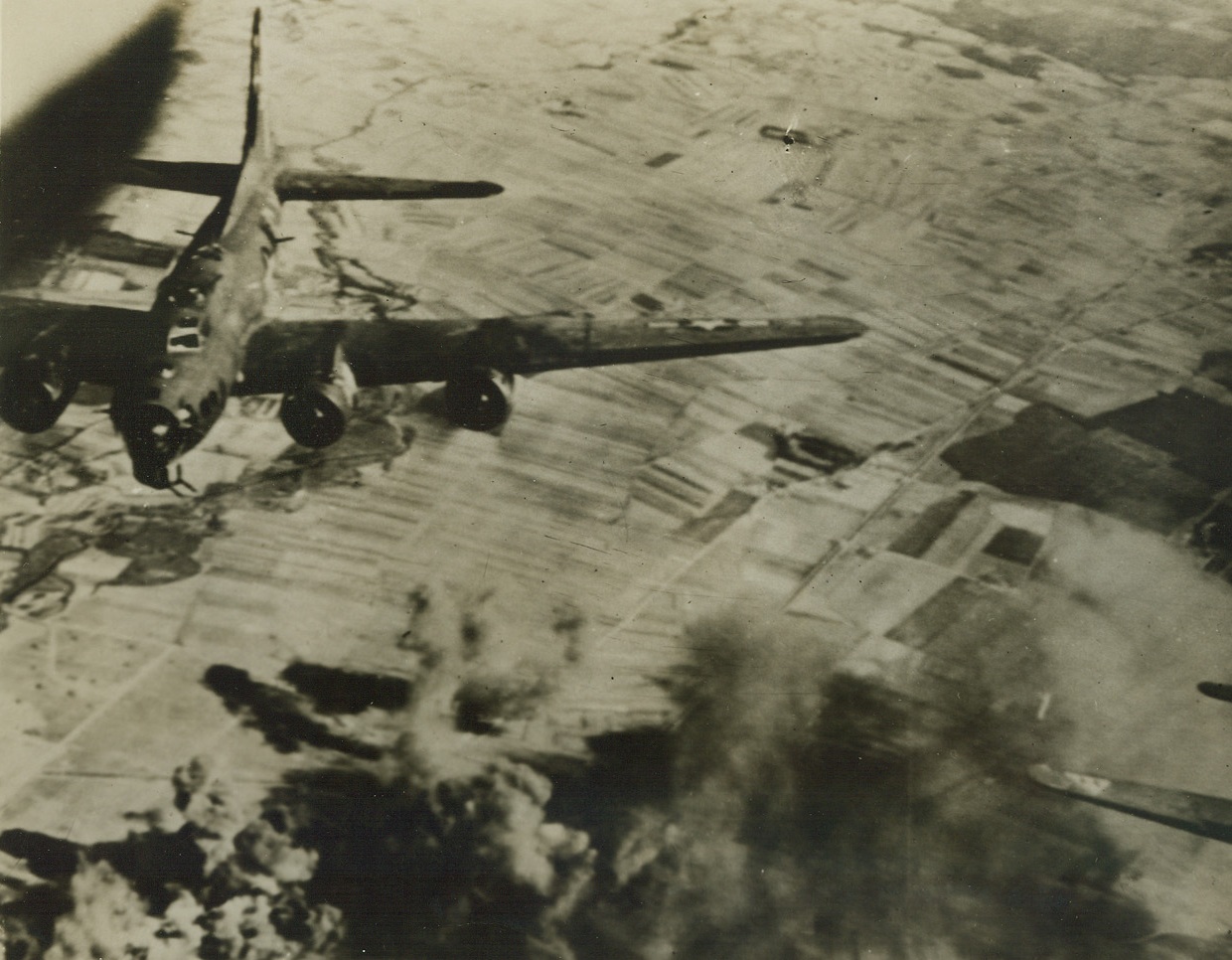 Mission Accomplished, 4/3/1944. England – Bombers are shown returning to their home bases after their attack on the Nazi’s twin-engine fighter base at Dijon, France. Credit: U.S. Army Radiotelephoto from ACME;