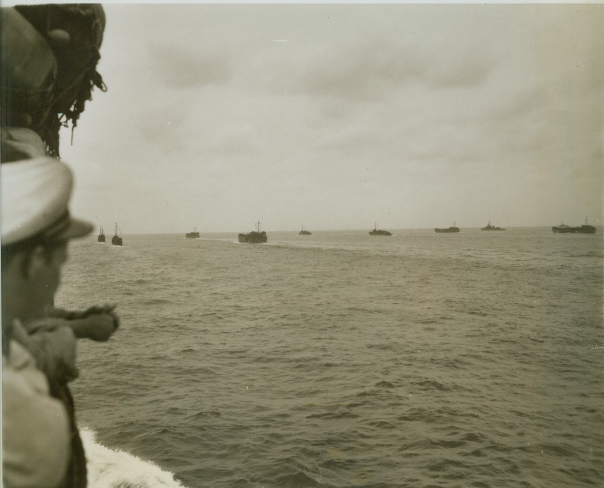PART OF HOLLANDIA INVASION FLEET, 5/3/1944. DUTCH NEW GUINEA – Landing craft and small warships of the great Allied Task Force that invaded Hollandia, Aitape, and Tanamerah Bay, near the coast of Dutch New Guinea during the attack. (Passed by censors.) Credit: ACME photo by Thomas L. Shafer for the War Picture Pool;