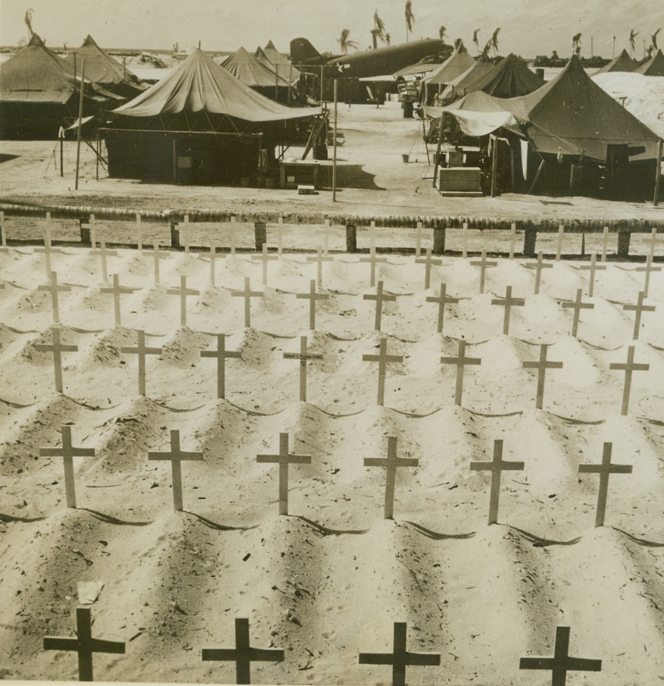 Tarawa Memorial, 5/2/1944. TARAWA--Rows of mounds with white crosses at their heads, mark the resting place for Americans who fell in the battle for Tarawa on November 20th 1943.  Nearby their comrades, housed in tents, carry on the fight against the Japs from the Gilberts Base.Credit:  US Navy Photo from ACME;