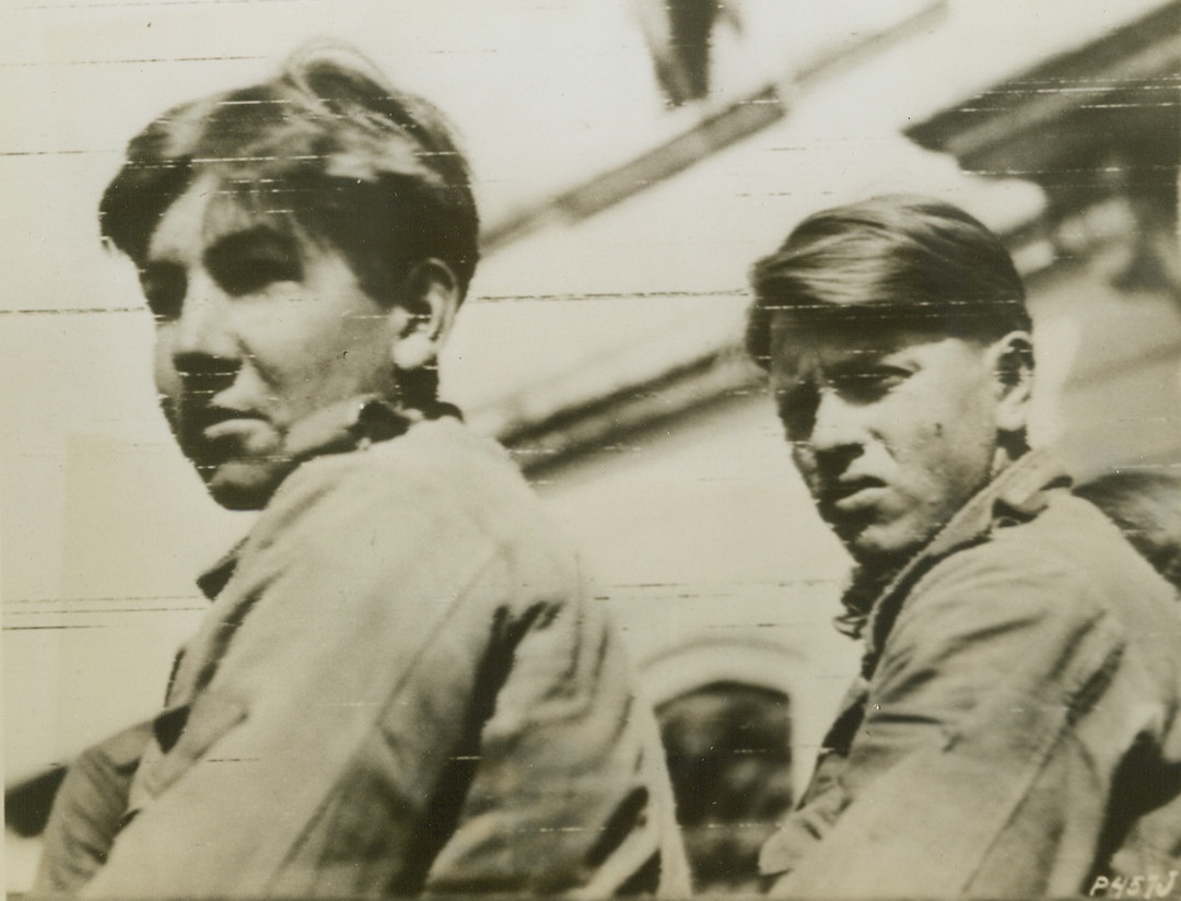 TEEN-AGE GERMAN PRISONERS, 5/26/1944. ITALY—In the current Italian offensive, these teen-age Germans were taken prisoners of war. The youths were captured after bitter fighting near Cisterna. Credit: Army Radiotelephoto from Acme;