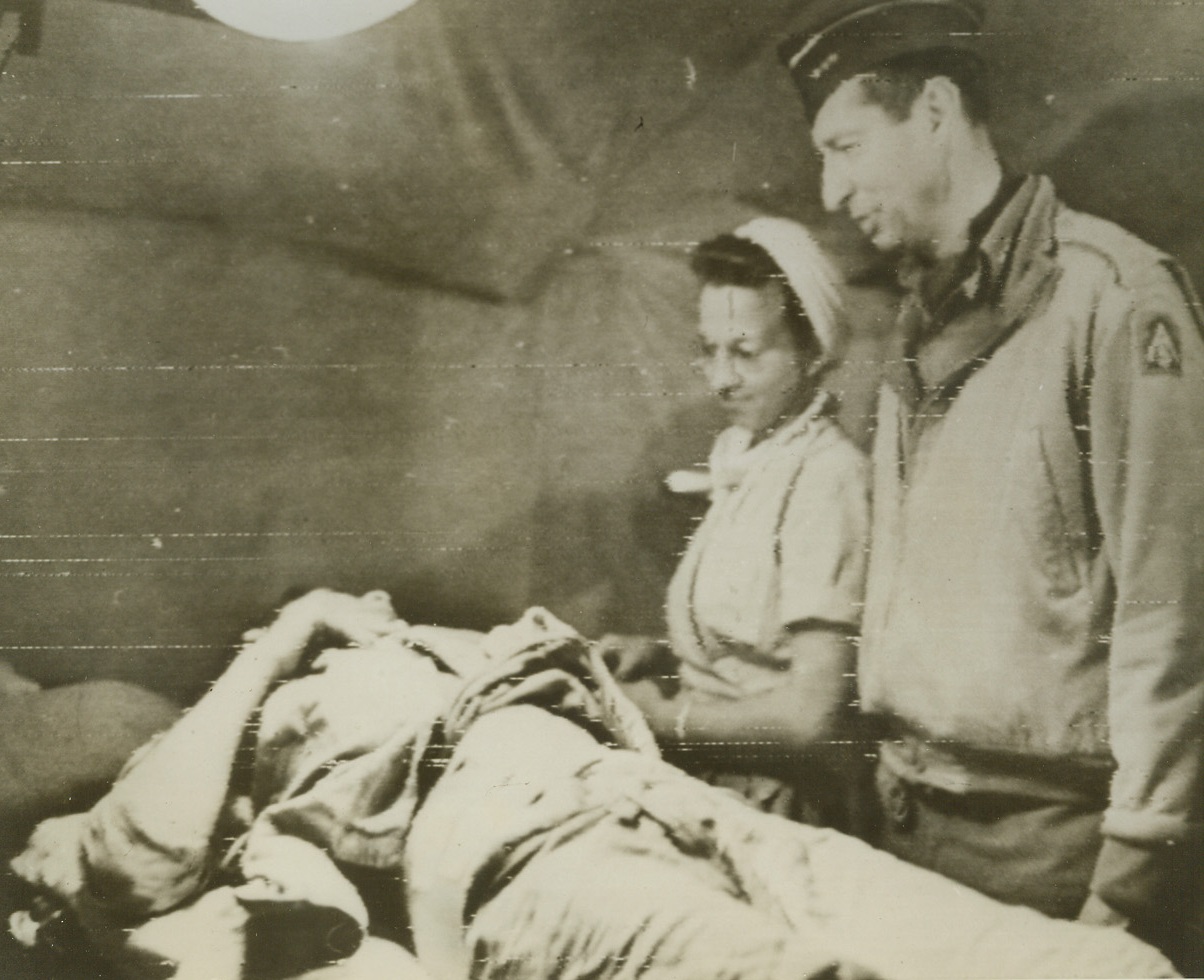 Four Star Sympathy, 5/29/1944. SOMEWHERE IN ITALY – Flat on his back after being treated for wounds received in the battle of Cisterna, an American soldier is visited by his “chief” – Lt. Gen. Mark W. Clark, commander of the Allied Fifth Army. The General chats with the felled fighter as a nurse looks on.Credit (U.S. Army Radiotelephoto from ACME);