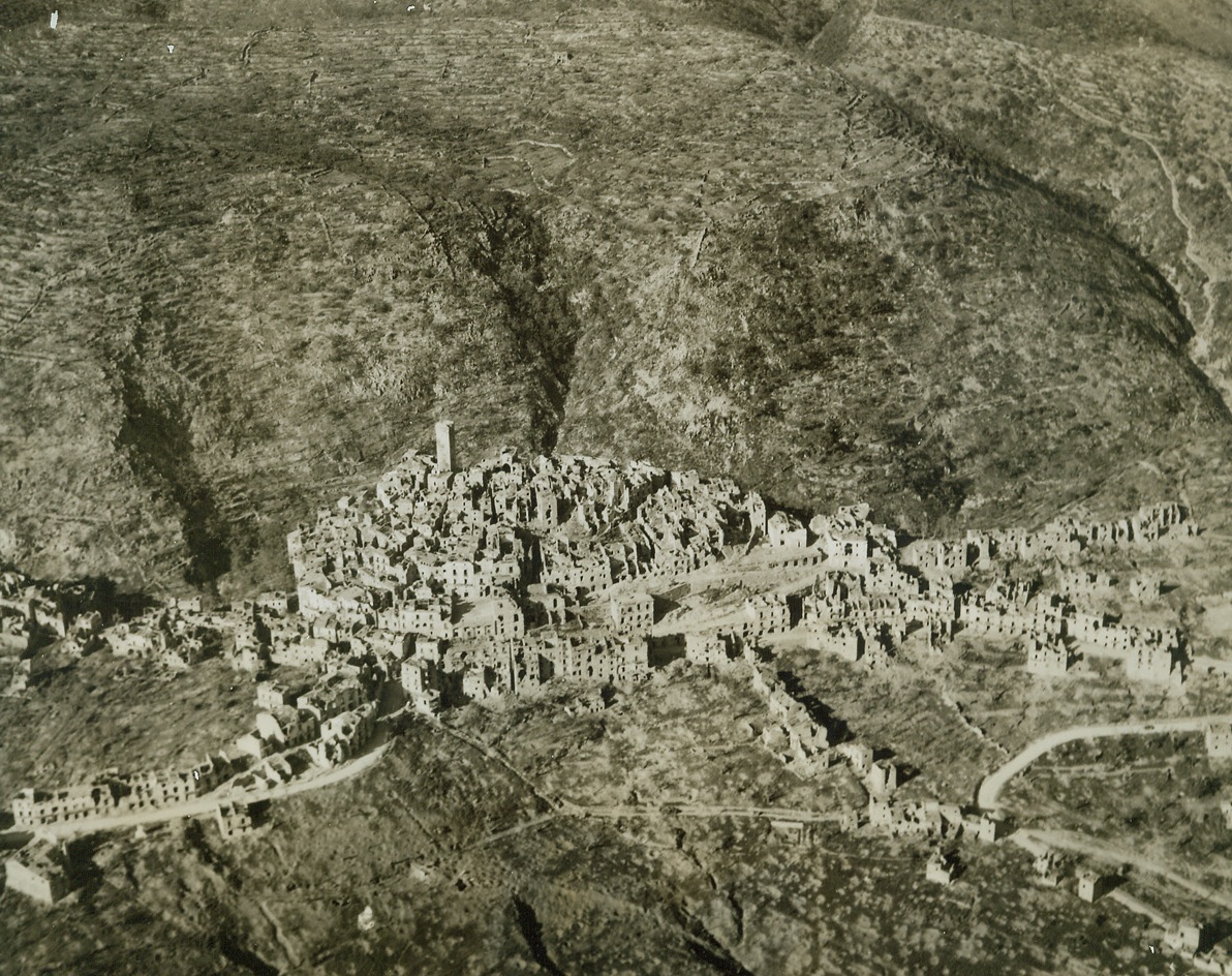 Stepping Stone to Rome, 5/25/1944. ITALY—Castleforte lies tranquilly in its mountain location in Italy after being shelled heavily by Allied artillery. The town fell to our forces early in the concerted march to Rome—hitting on all gears now. Credit-WP-(ACME Photo by Charles Seawood, War Pool Correspondent);