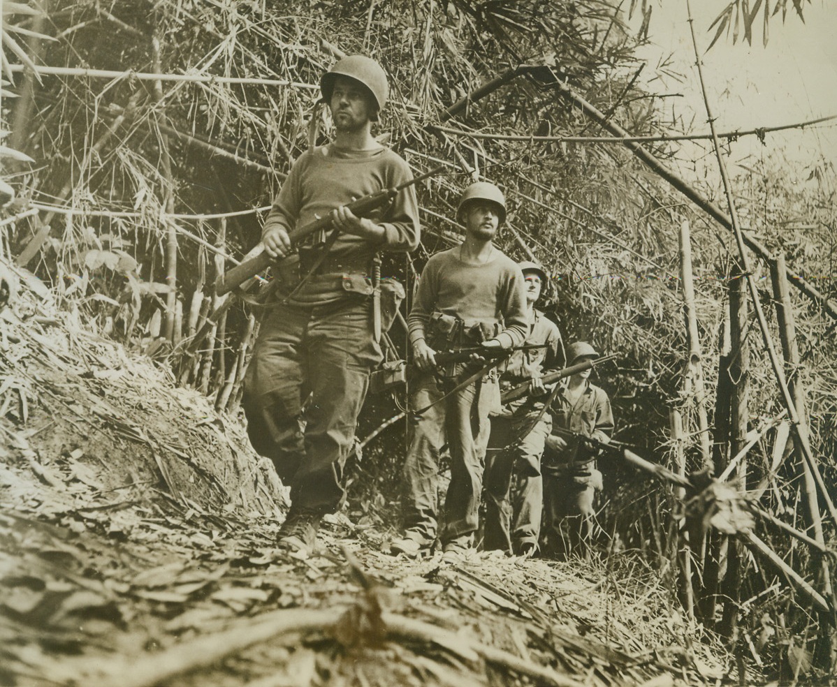 Headed for Trouble and Japs, 6/16/1944. Burma – Patrolling the jungles for Jap snipers, these four members of the famed Merrill’s Marauders are grim and determined as they go about their task.  The jungle fighters are (left to right): Lt. Kenneth Bratlof, Cloquet, Minn.; Pvt. Anthony Callisto, Solvay, N.Y., Pvt. Sidney Block, Philadelphia, Pa.; and Pfc Harry Brabazon, also of Philadelphia, Pa.  Marauders are now supers jungle fighters and casualties average one Marauder to fifty Japs. Credit – WP – (ACME);